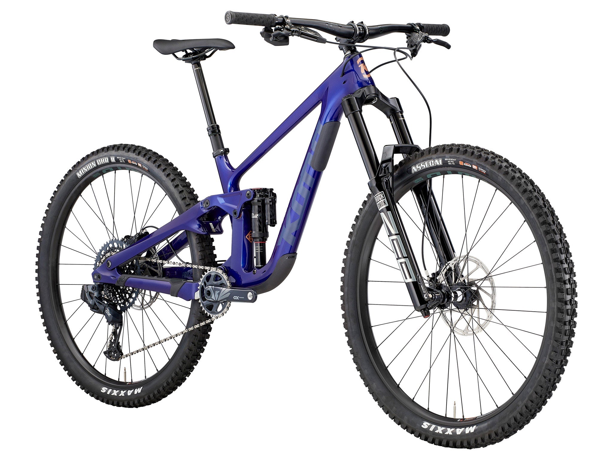 Rider navigating technical terrain on the Kona Process X CR DL full suspension bike.