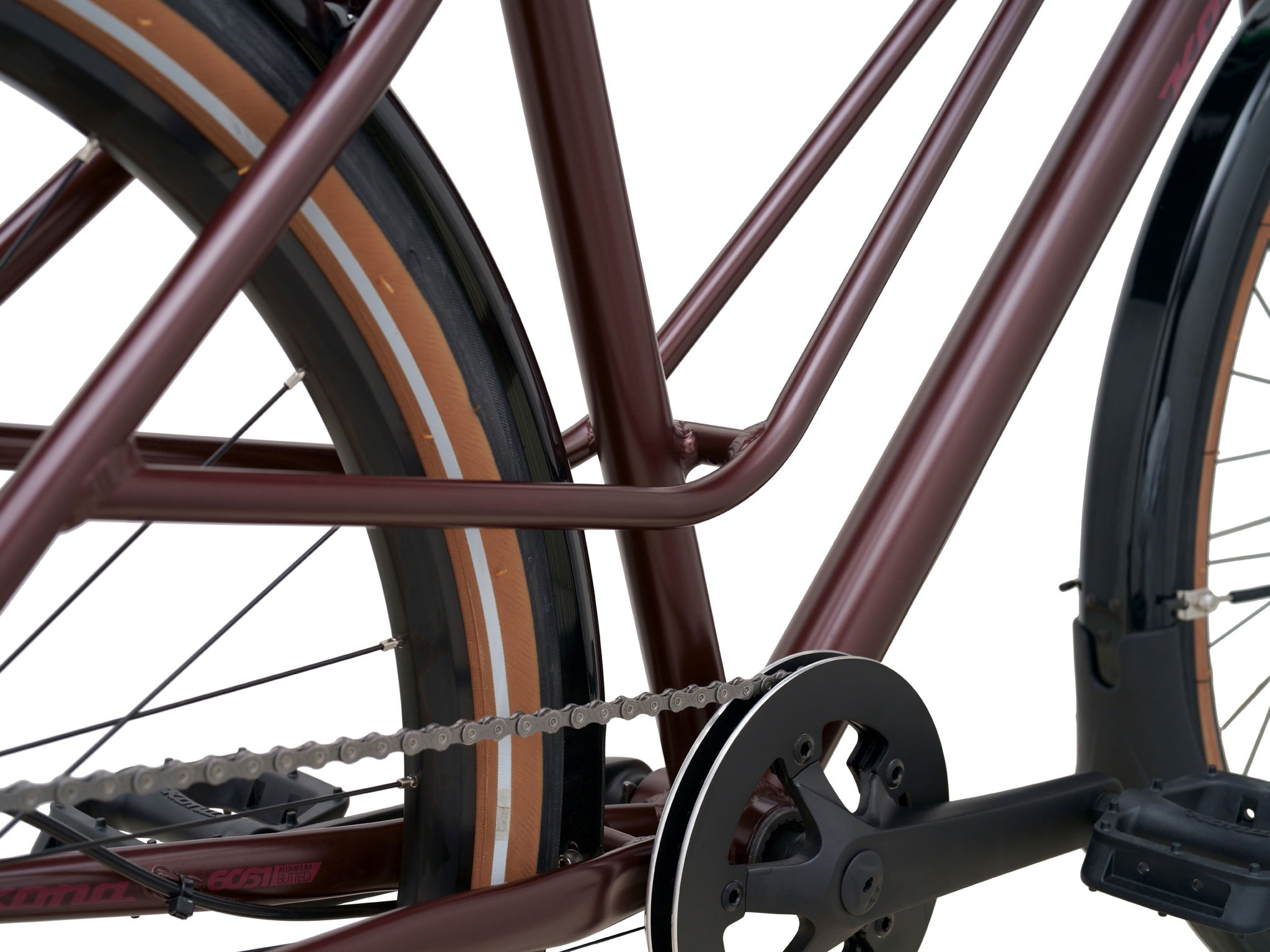 Close-up of the Coco Cruisers puncture-resistant tires and clean internal cable routing.