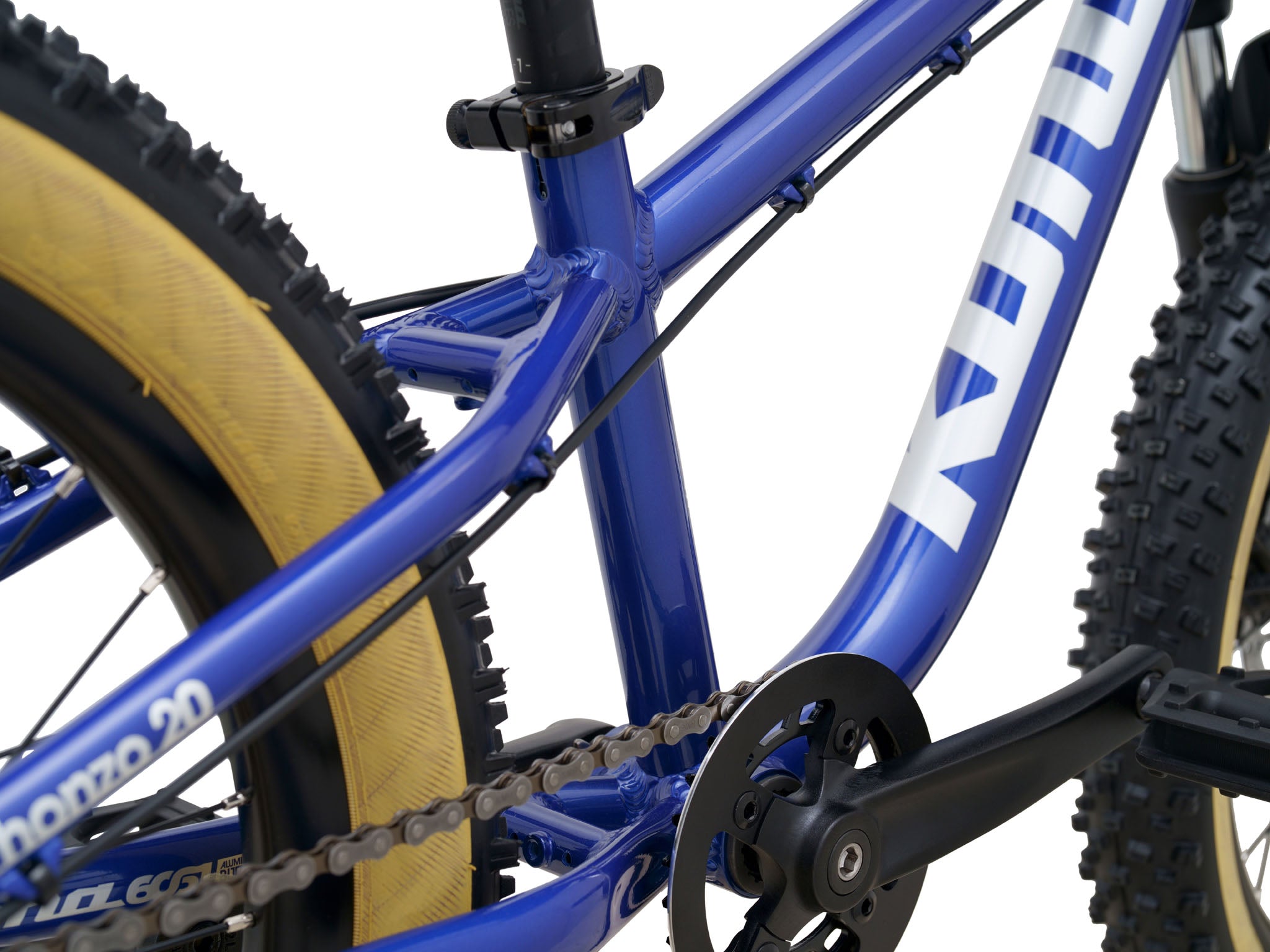 TrailRipper 20 parked near rocky terrain with sunlight casting shadows – ideal for trail biking