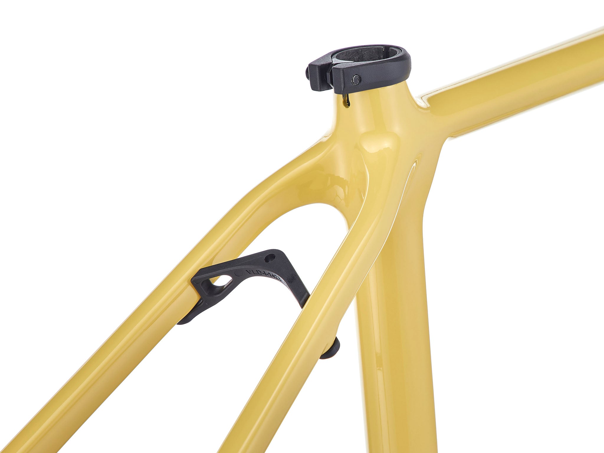 Close-up of the lightweight gravel bike frame showing its sleek geometry and tire clearance