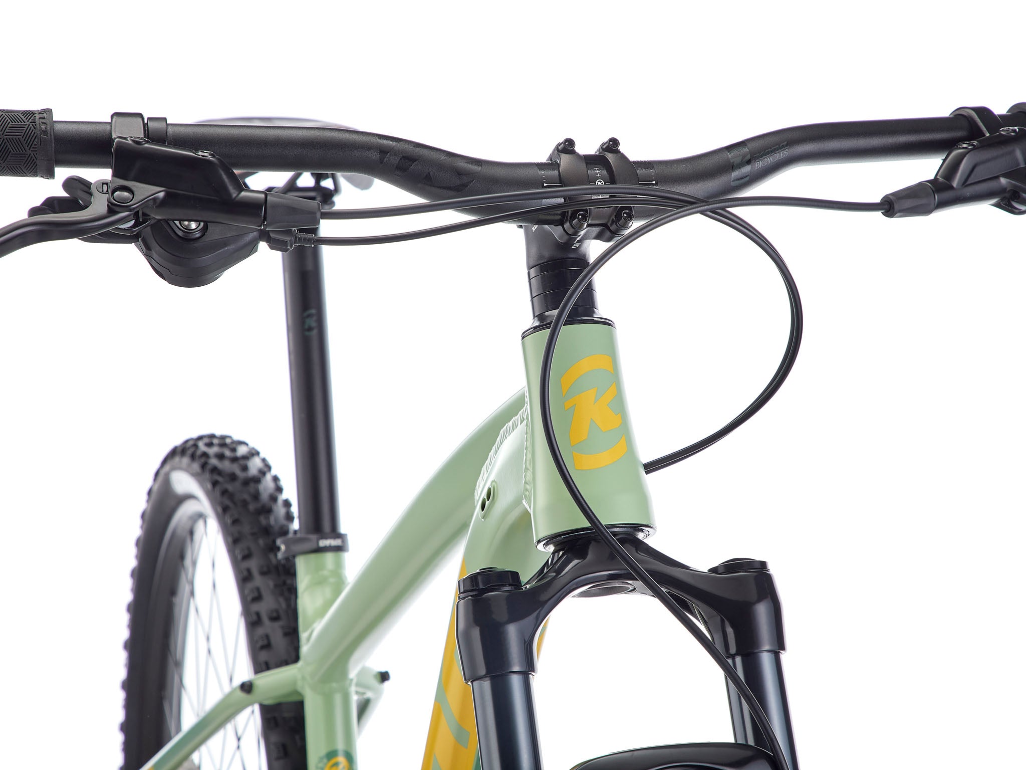 Rider using the TrailBlazer 29 Mountain Bike on a rugged trail, demonstrating its performance.