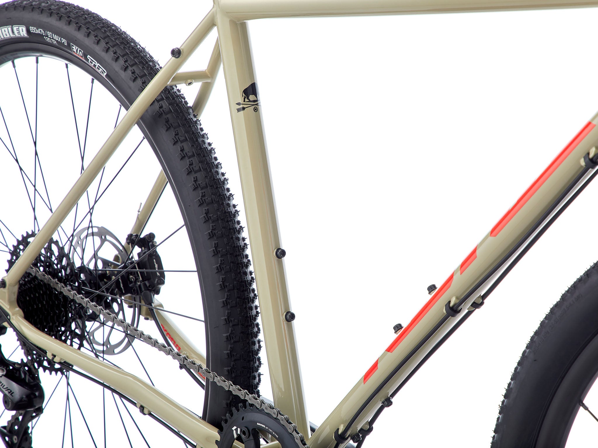 Rider using the Rove DL mountain bike on gravel paths, demonstrating comfort and control in real-world conditions.