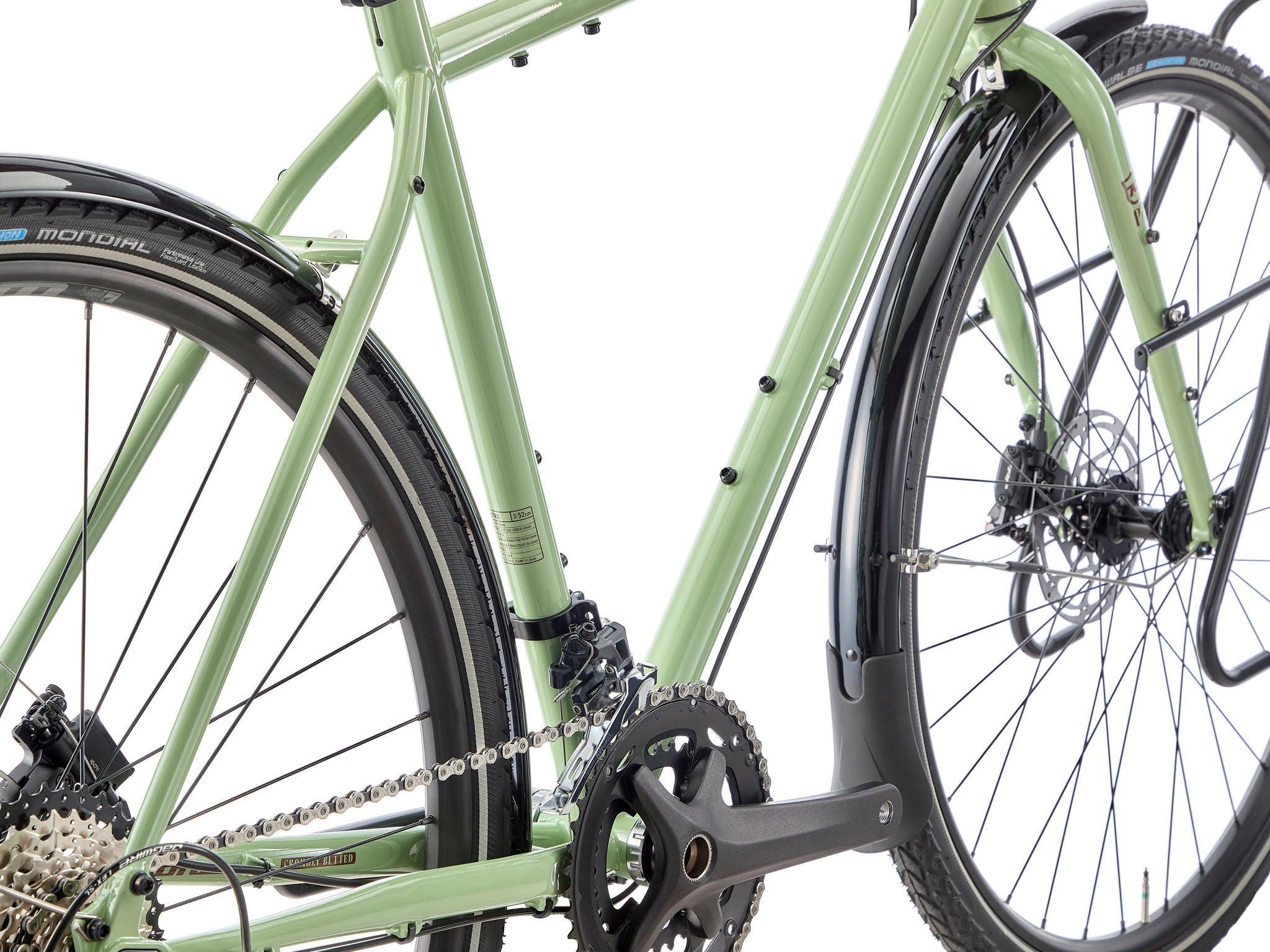 Side view of Sutra steel touring bike with fenders and rack, ideal for long rides