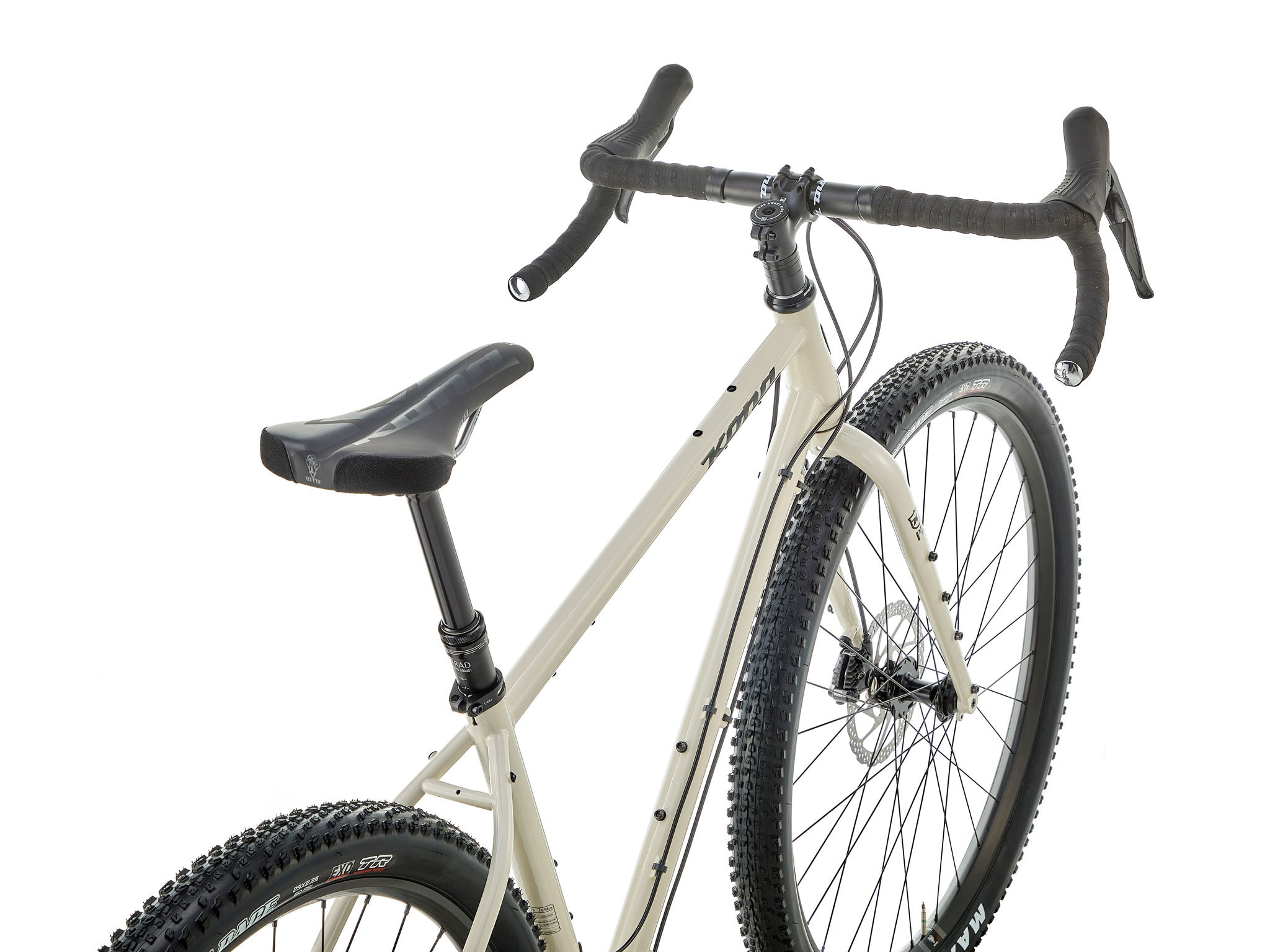 Side-profile of Sutra LTD adventure bike loaded with bike-packing bags on a misty ridge