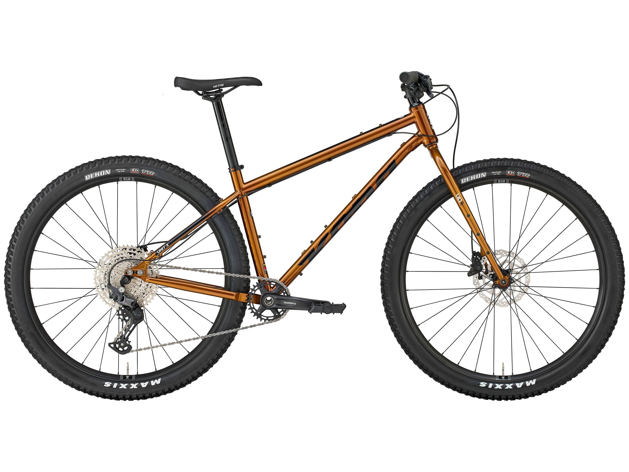 Side view of Kona Unit X bike on mountain trail, perfect for bikepacking adventures