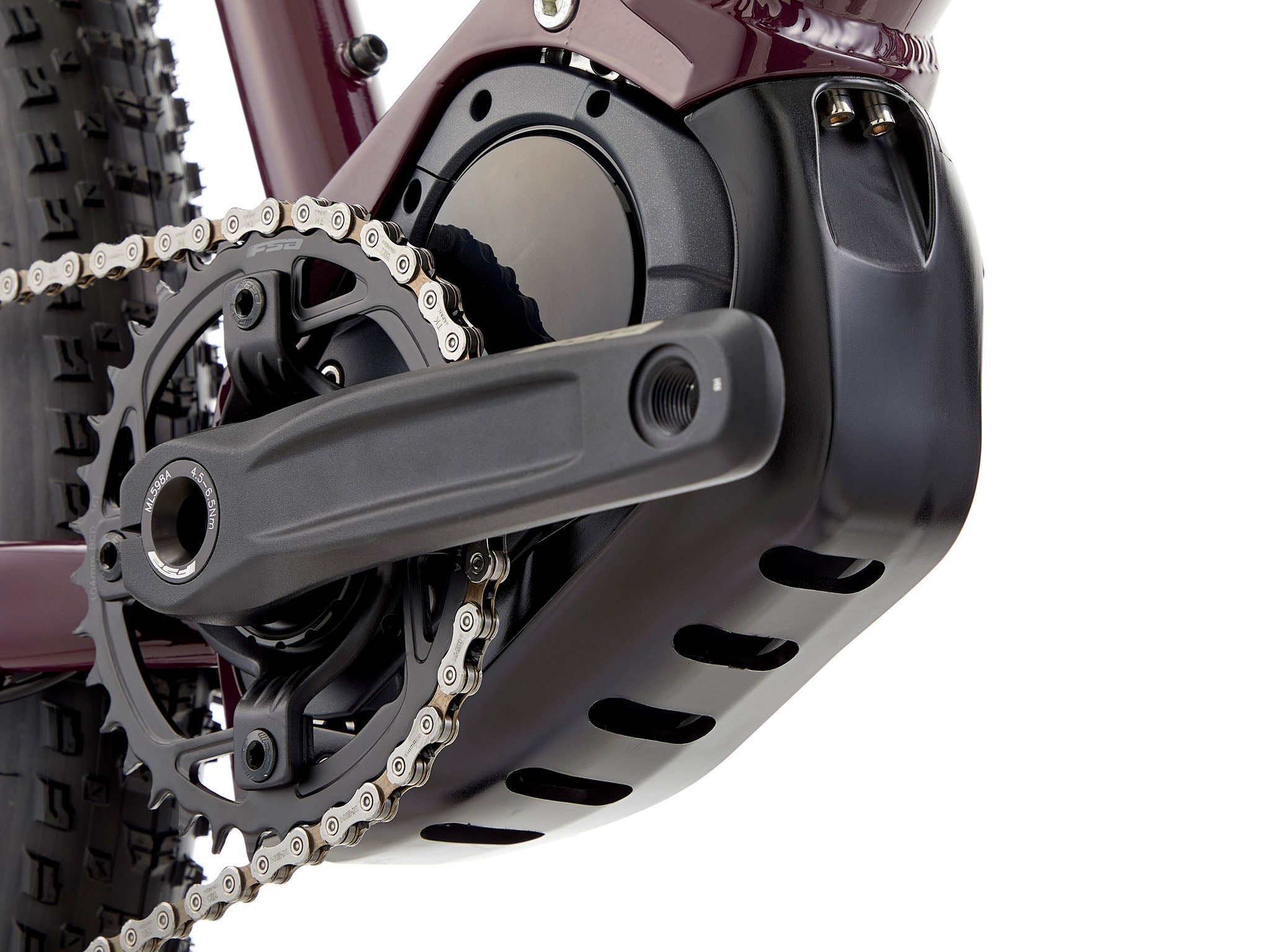 El Kahuna electric mountain bike on a forest trail, showcasing its robust design.