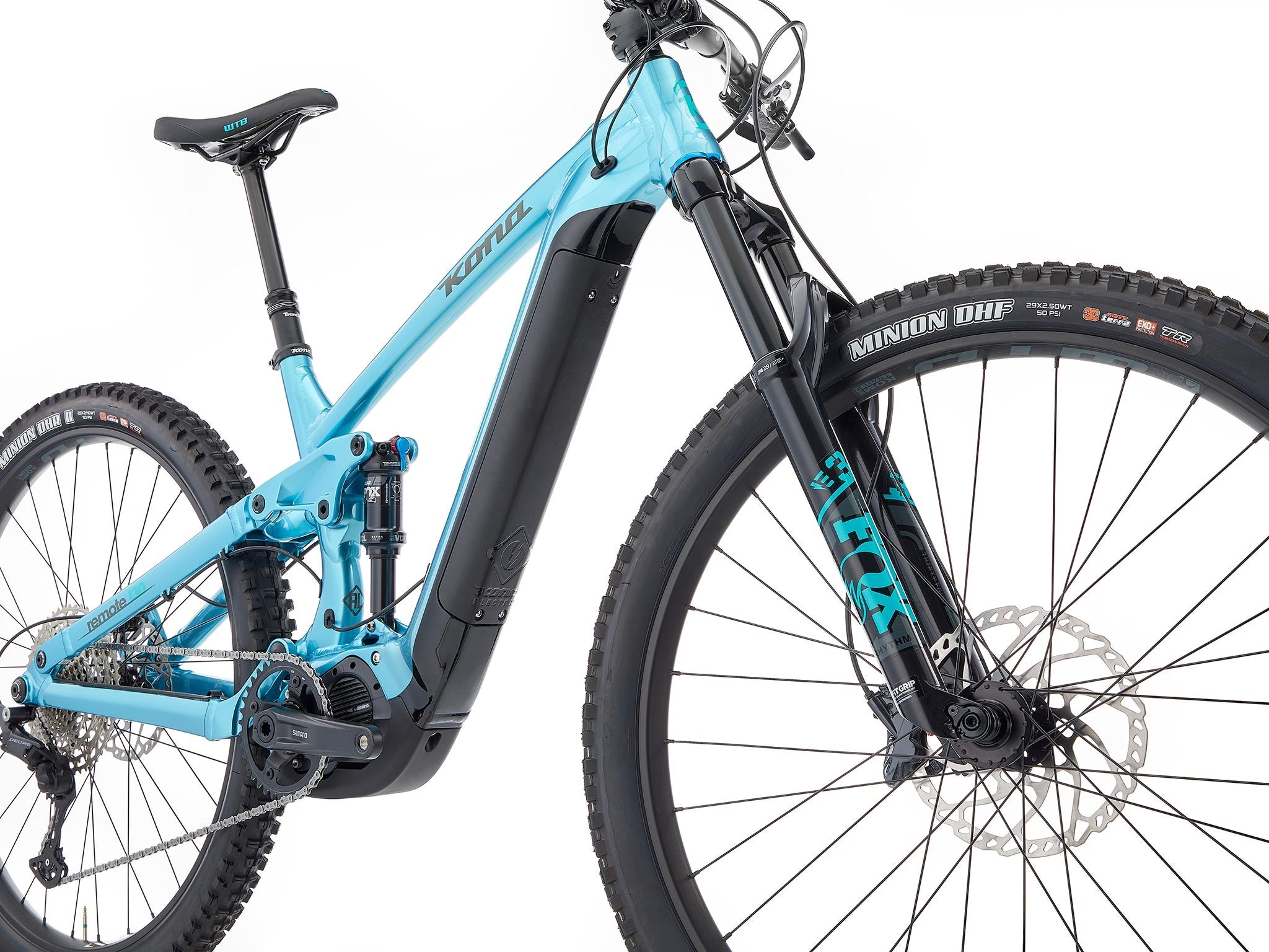 Rider climbing a steep forest trail on the Remote 130 electric trail bike