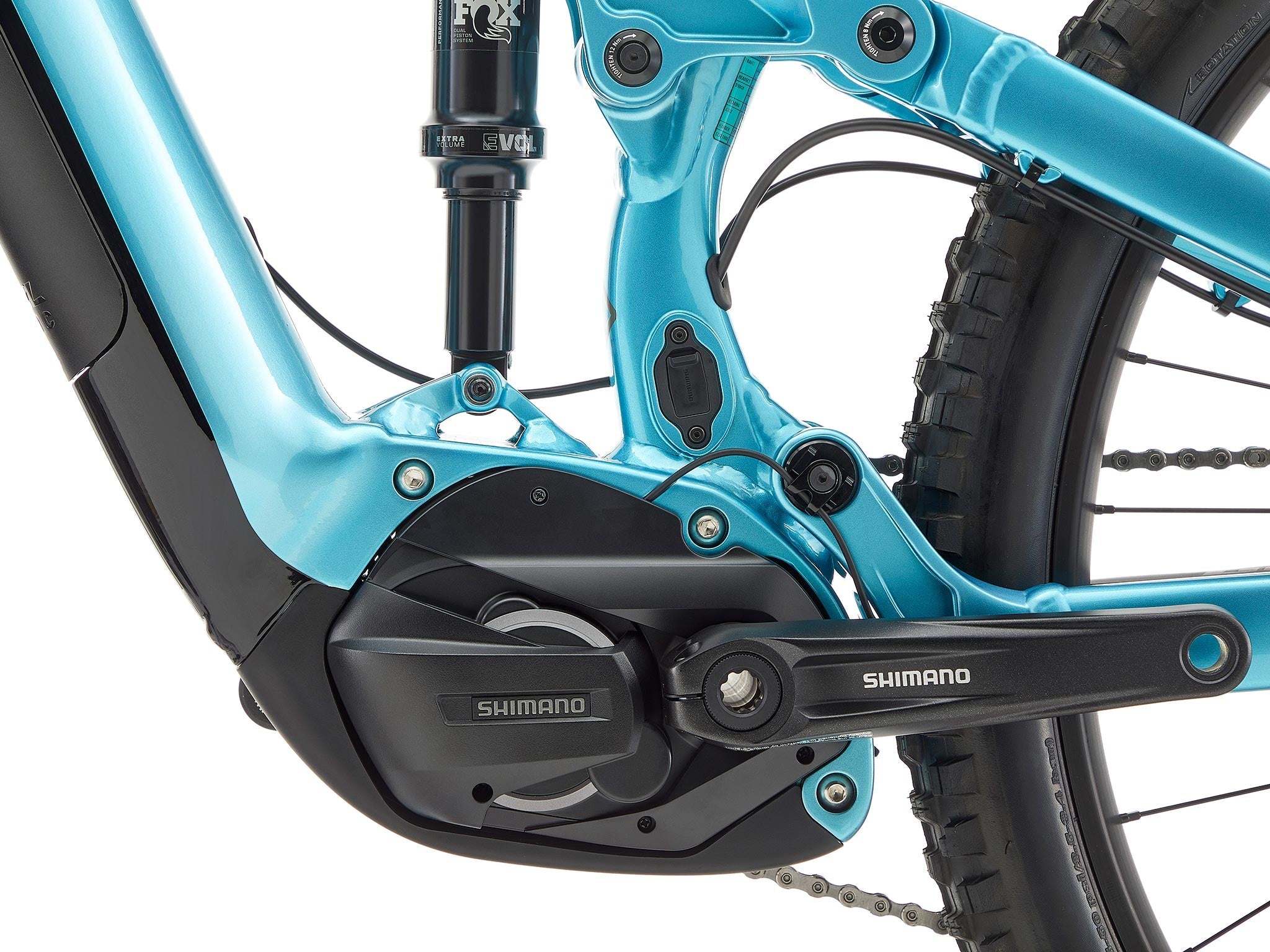 Remote 130 e mountain bike on rugged trail with 29-inch wheels and suspension
