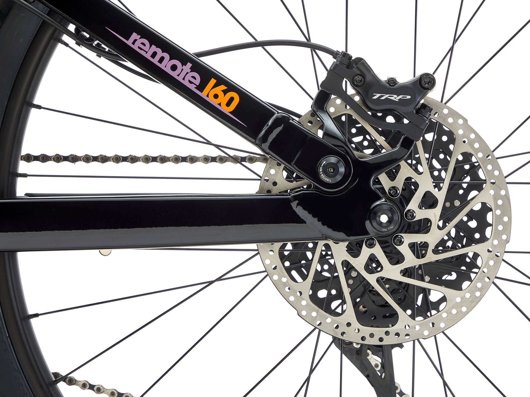 Remote 160 e-MTB in action, descending a rocky path, demonstrating its 160mm travel capabilities.