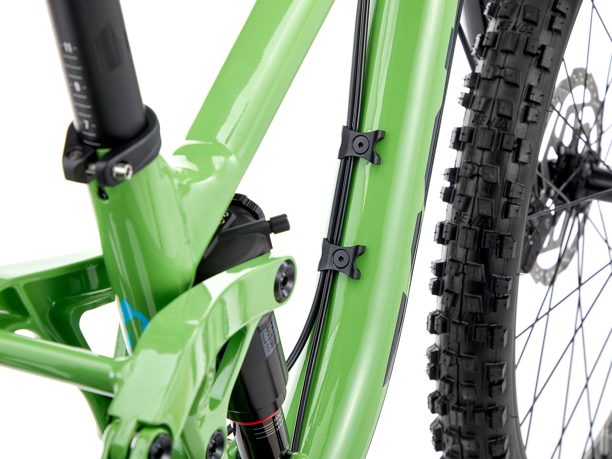 TrailBlazer 24 mountain bike showcasing its sleek design on a downhill trail.