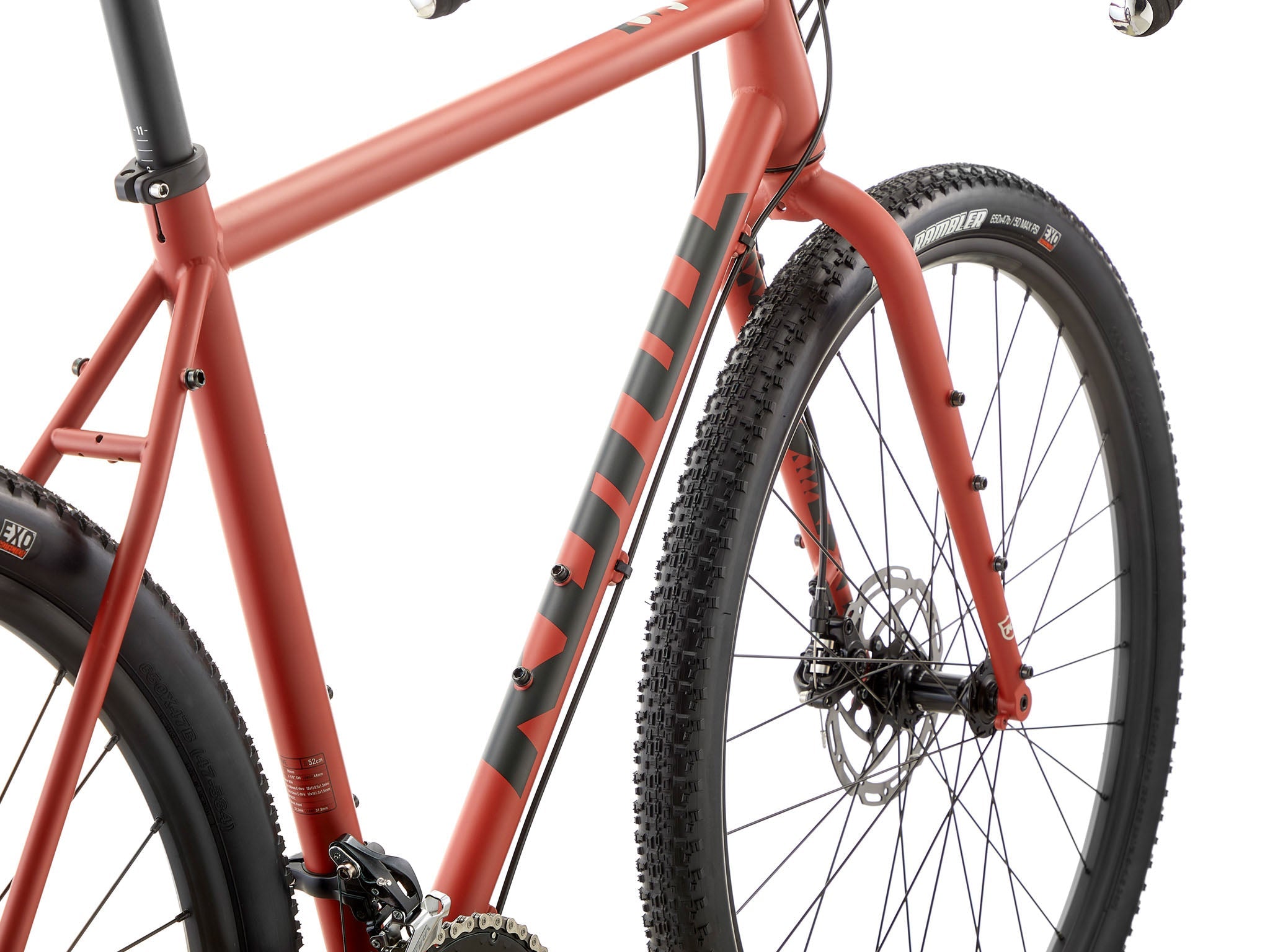 Side view of Rove steel gravel bike on urban street