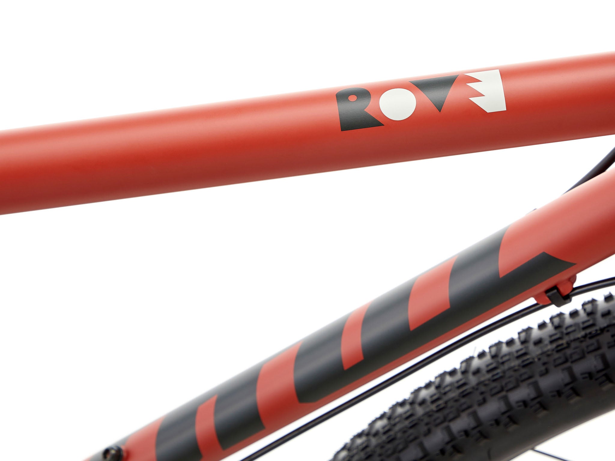 Rove bike being ridden over gravel trail