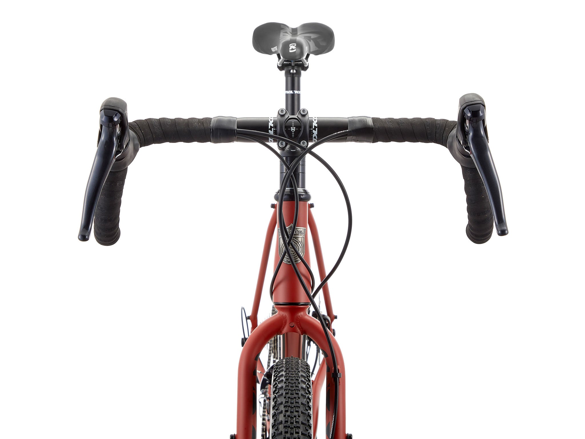 Side view of Rove steel gravel bike on urban street
