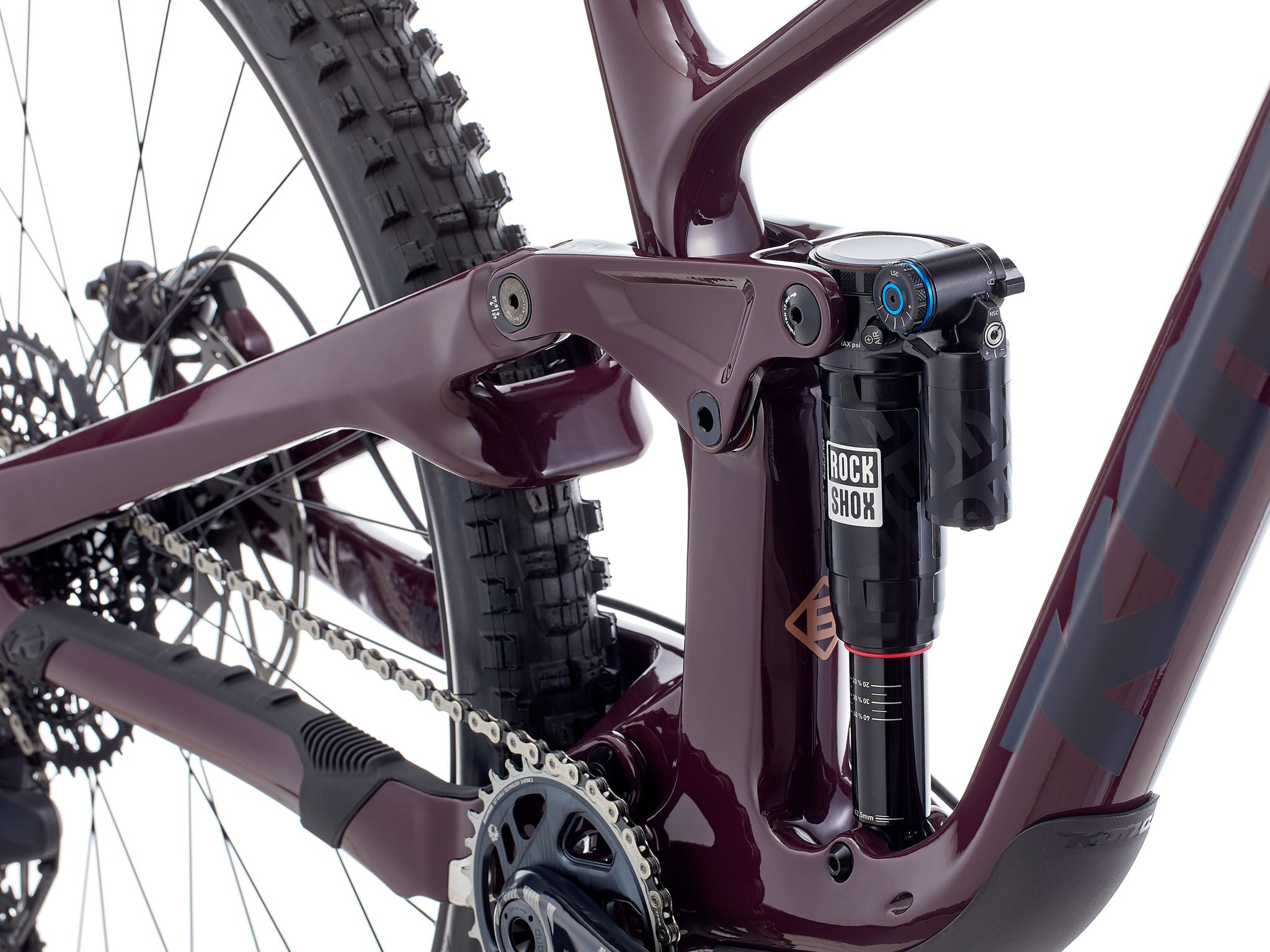 Action shot of rider descending rocky trail on the Kona Process X DL, highlighting 170mm travel