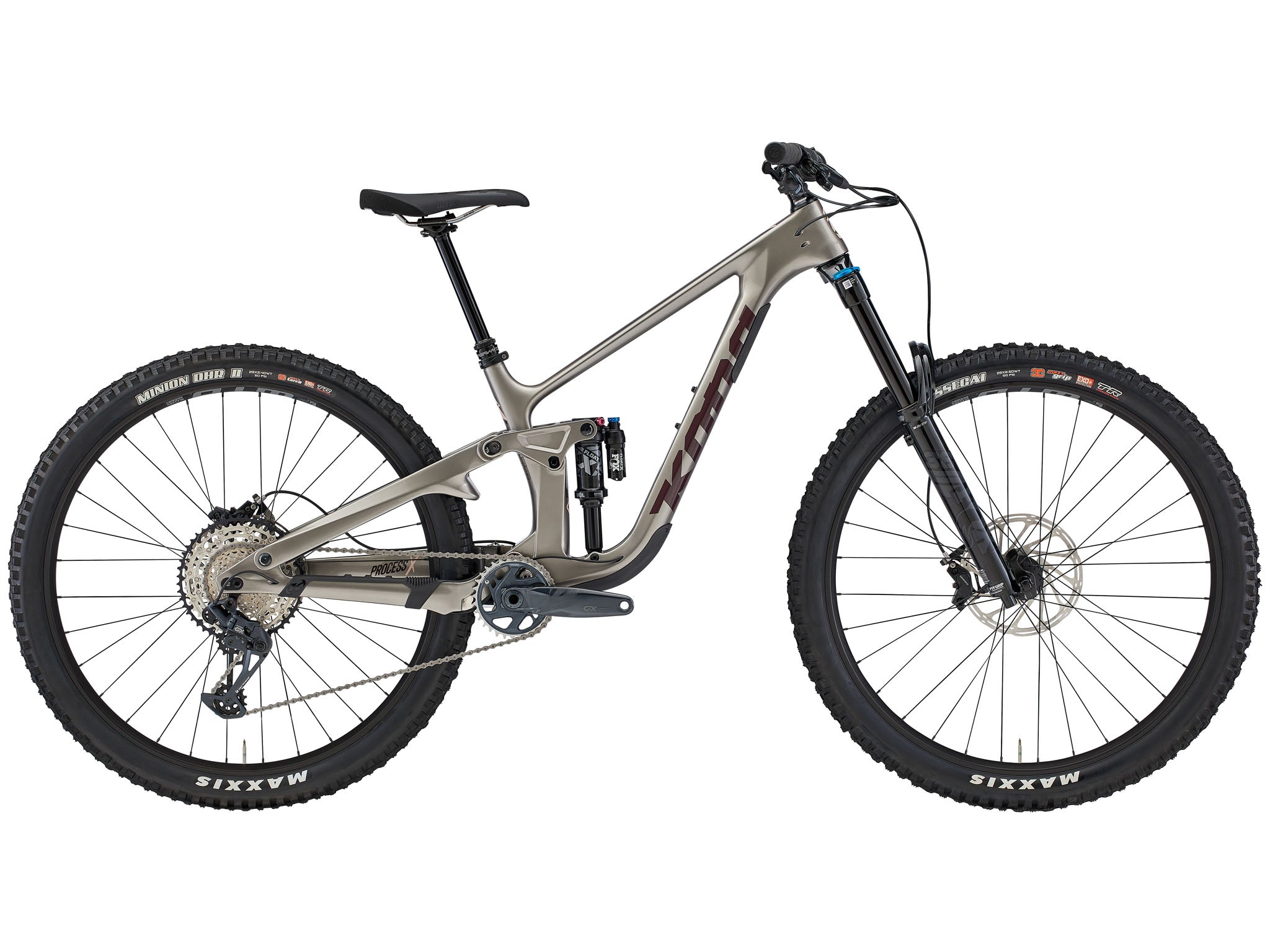 Side view of the carbon frame downhill bike for sale on a dusty alpine ridge