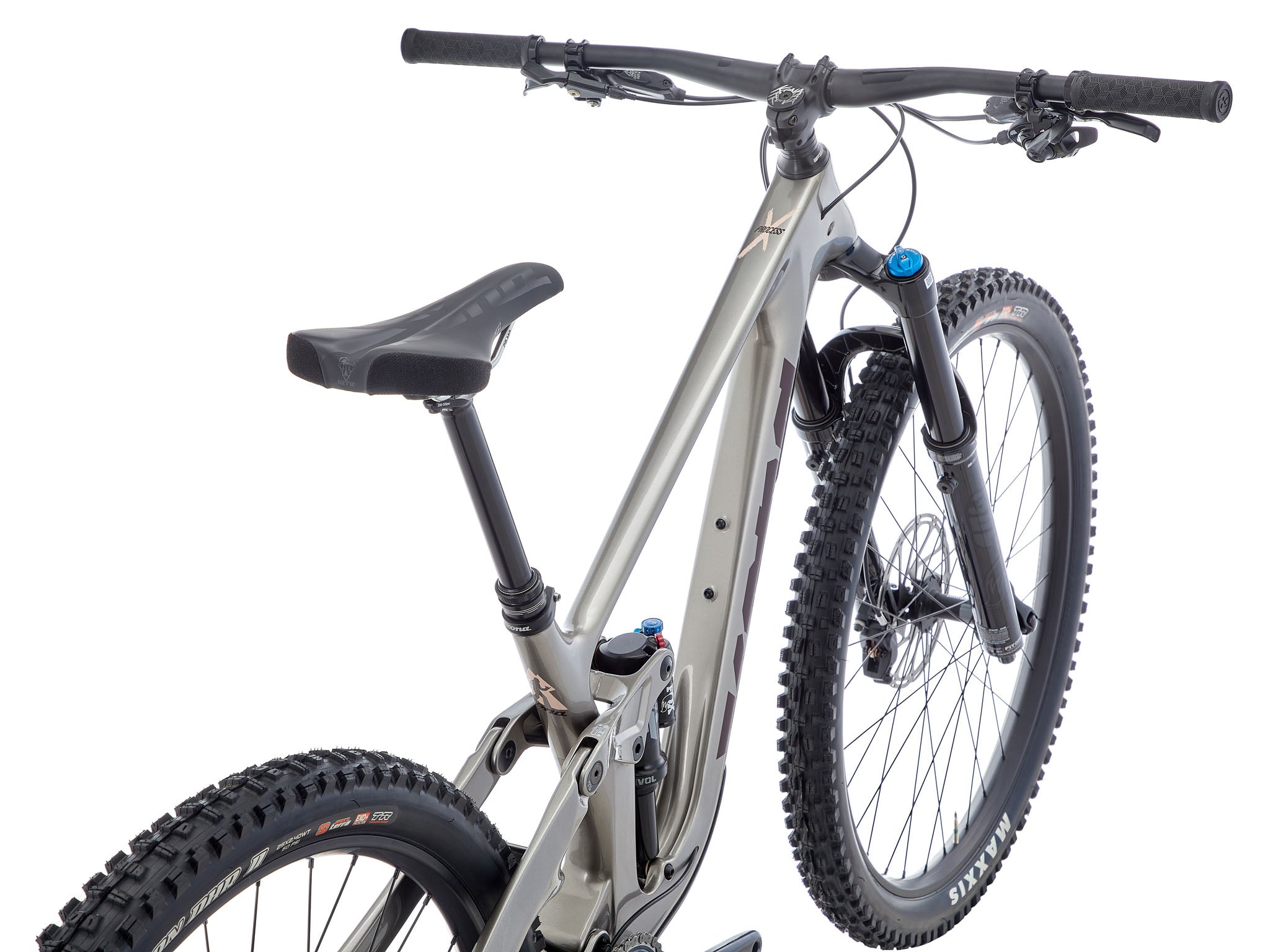 Side view of the carbon frame downhill bike for sale on a dusty alpine ridge