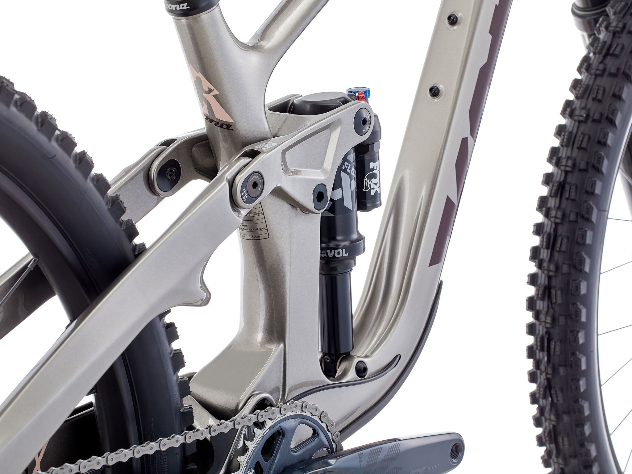 Side view of the carbon frame downhill bike for sale on a dusty alpine ridge