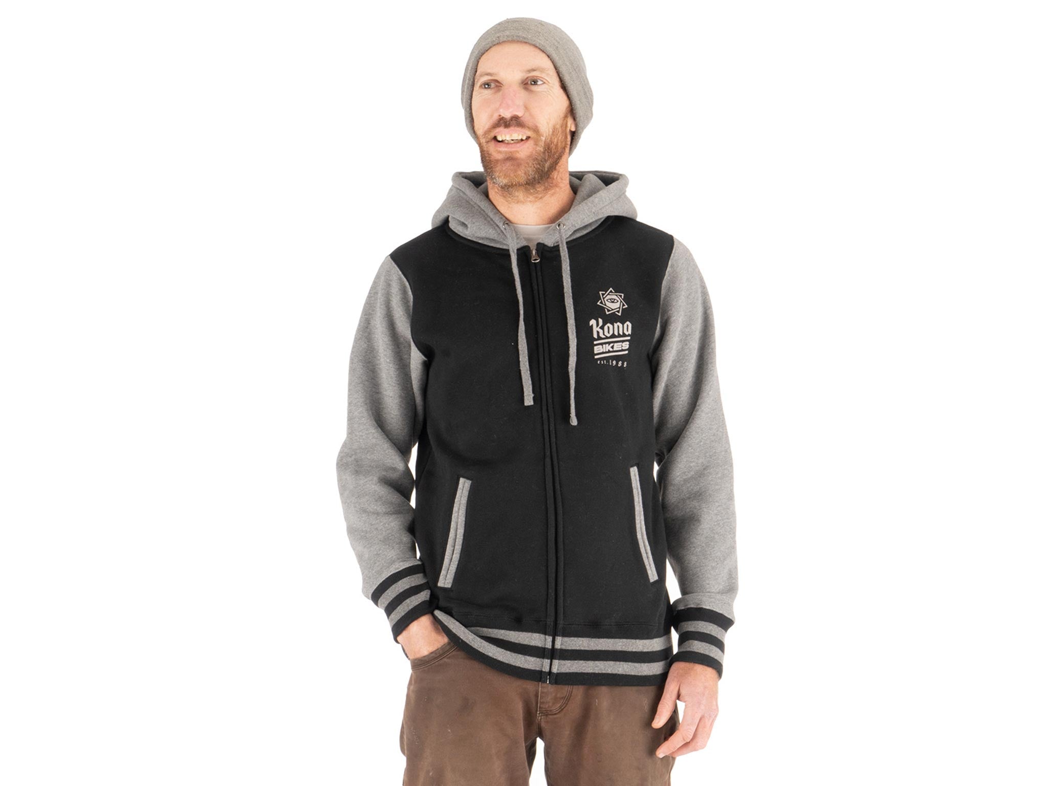 Model wearing trendy hoodies for college students in a casual outdoor setting