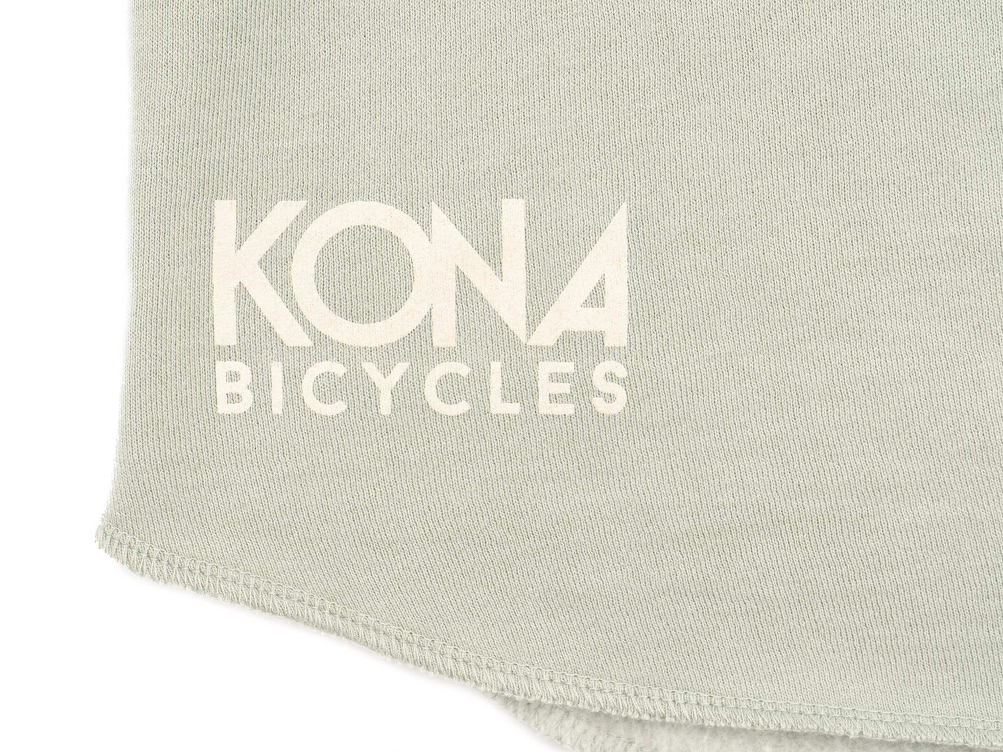 Detail shot of the hoodie showcasing its soft fleece interior and raglan sleeves.