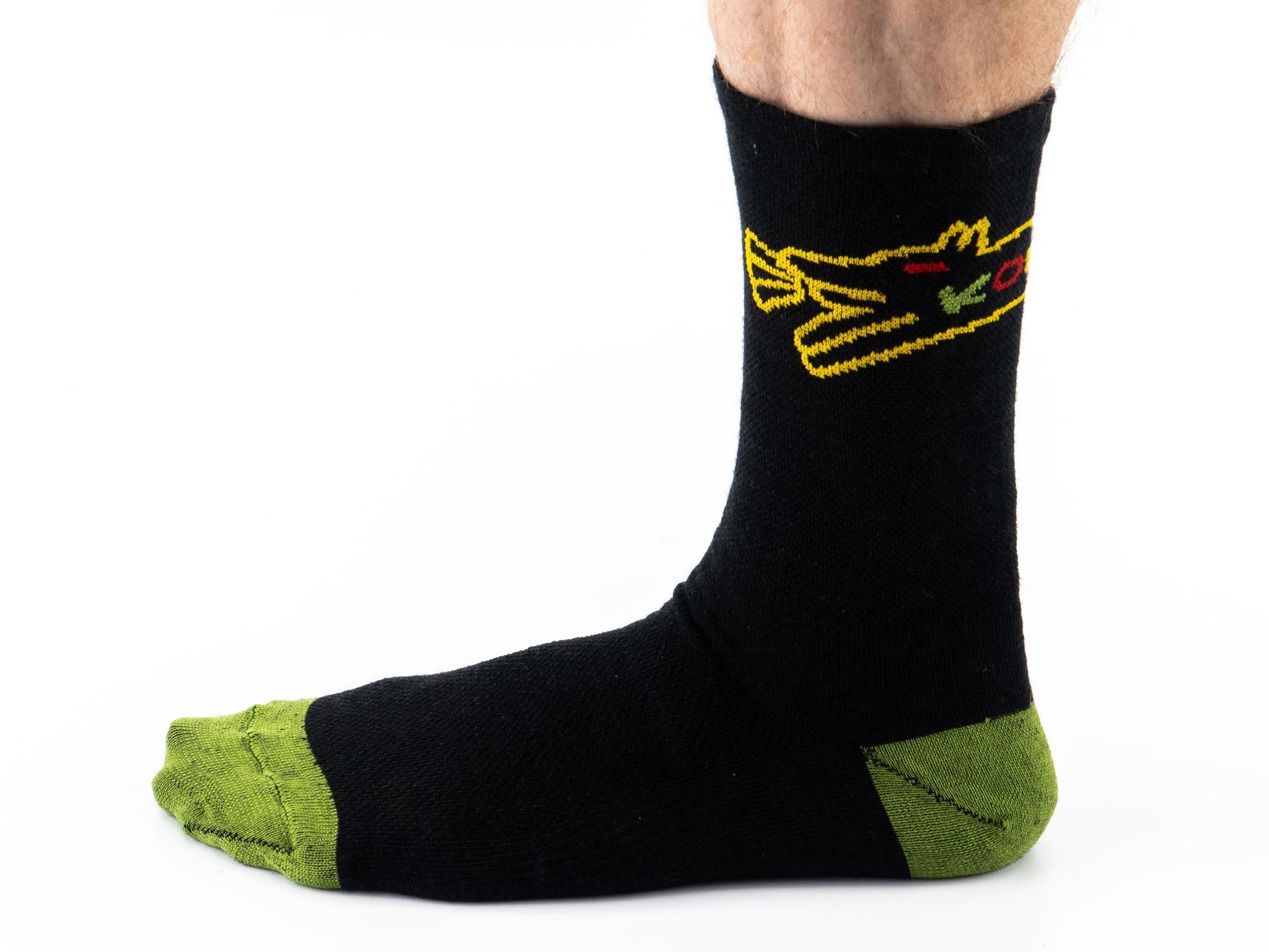 Outdoor woman wearing durable wool socks during a mountain hike