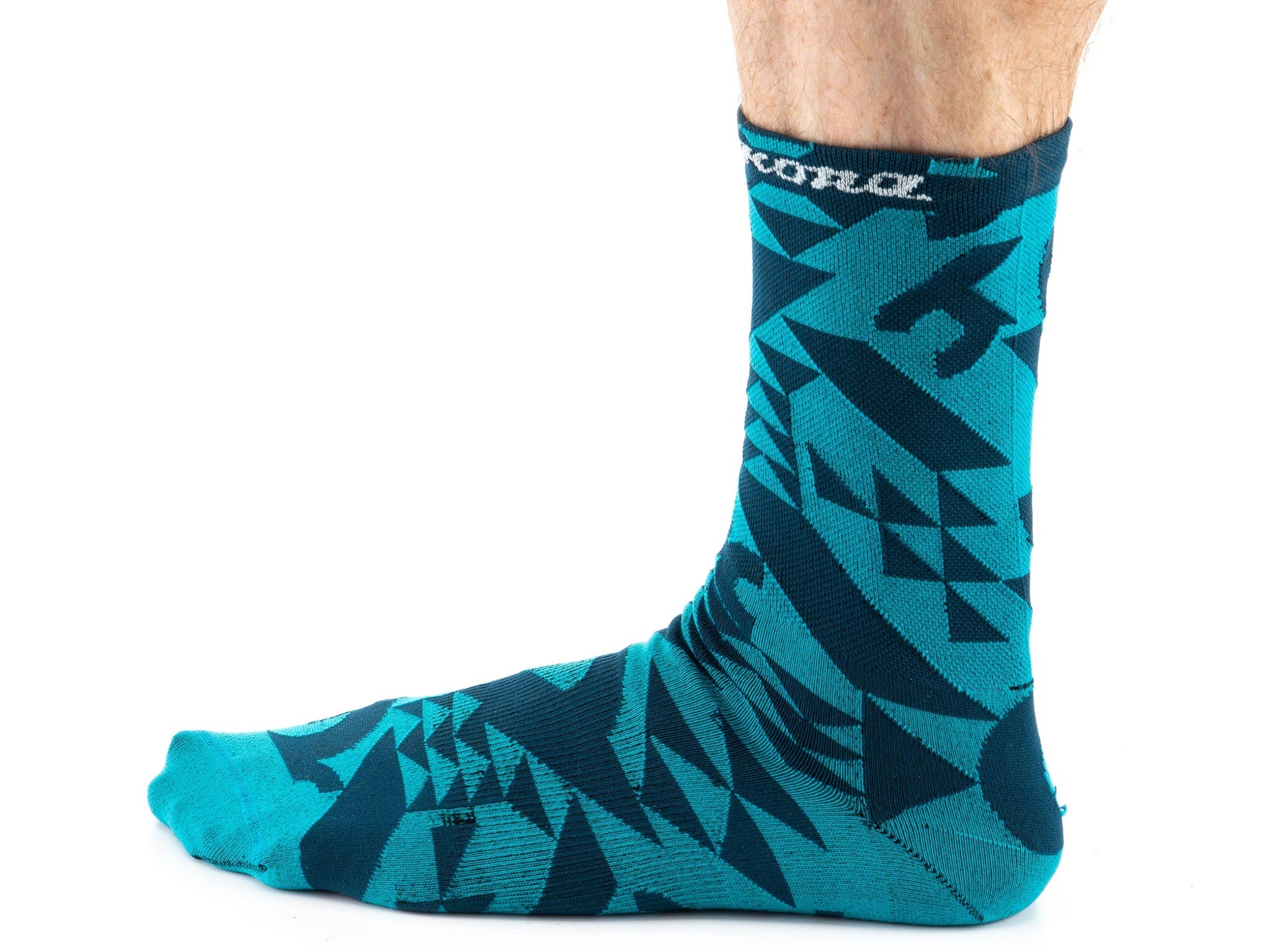 Close-up of Kona Rove socks highlighting the comfort fit for athletic activities.