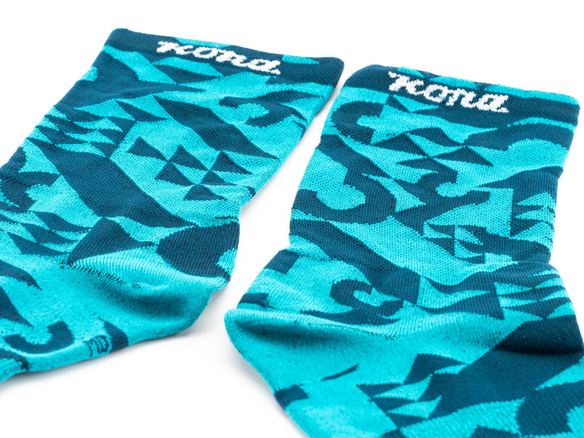 Kona Rove performance socks showcasing the 5-inch cuff and poly blend material.