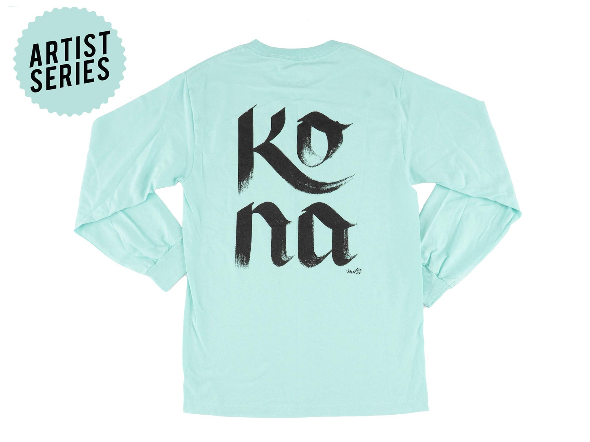 Model wearing Mary Do Calligraphy Long Sleeve T-Shirt outdoors, highlighting its versatility.