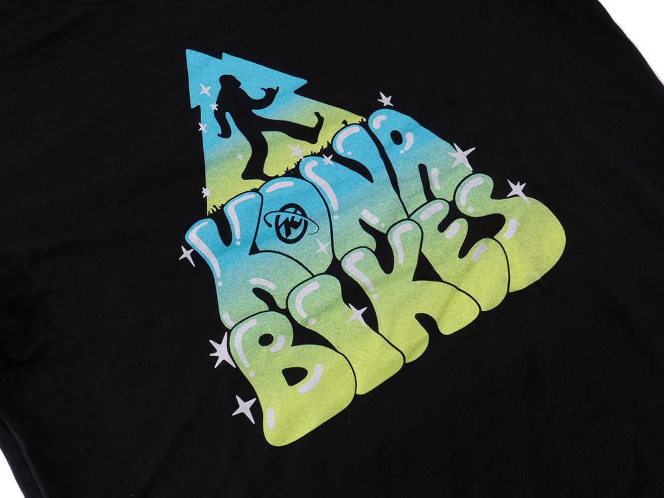 Close-up shot of the soft fabric of the Vibrant Comfort Graphic Tee, illustrating its comfort and quality.