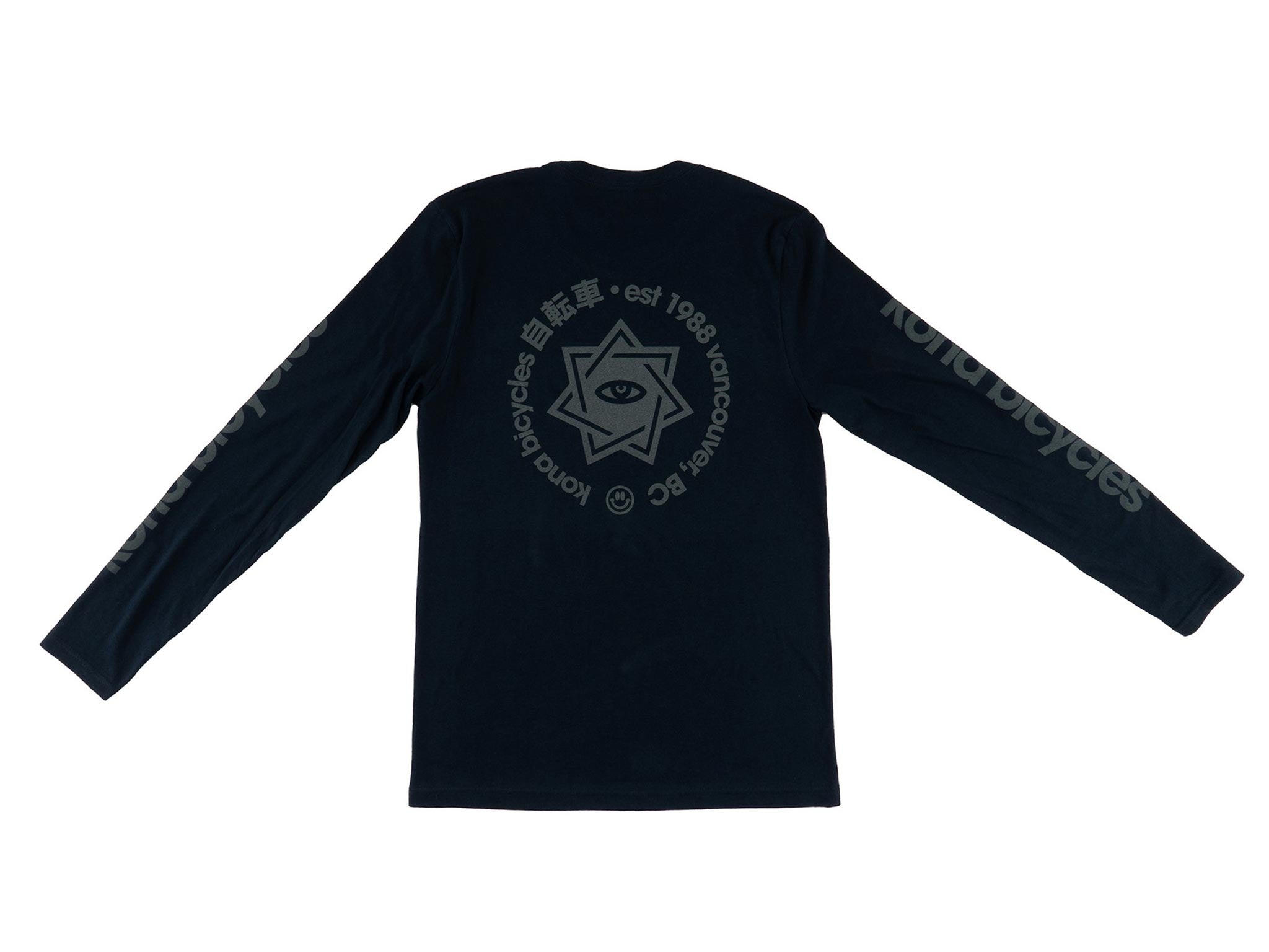 Model wearing streetwear long sleeve tee on city street