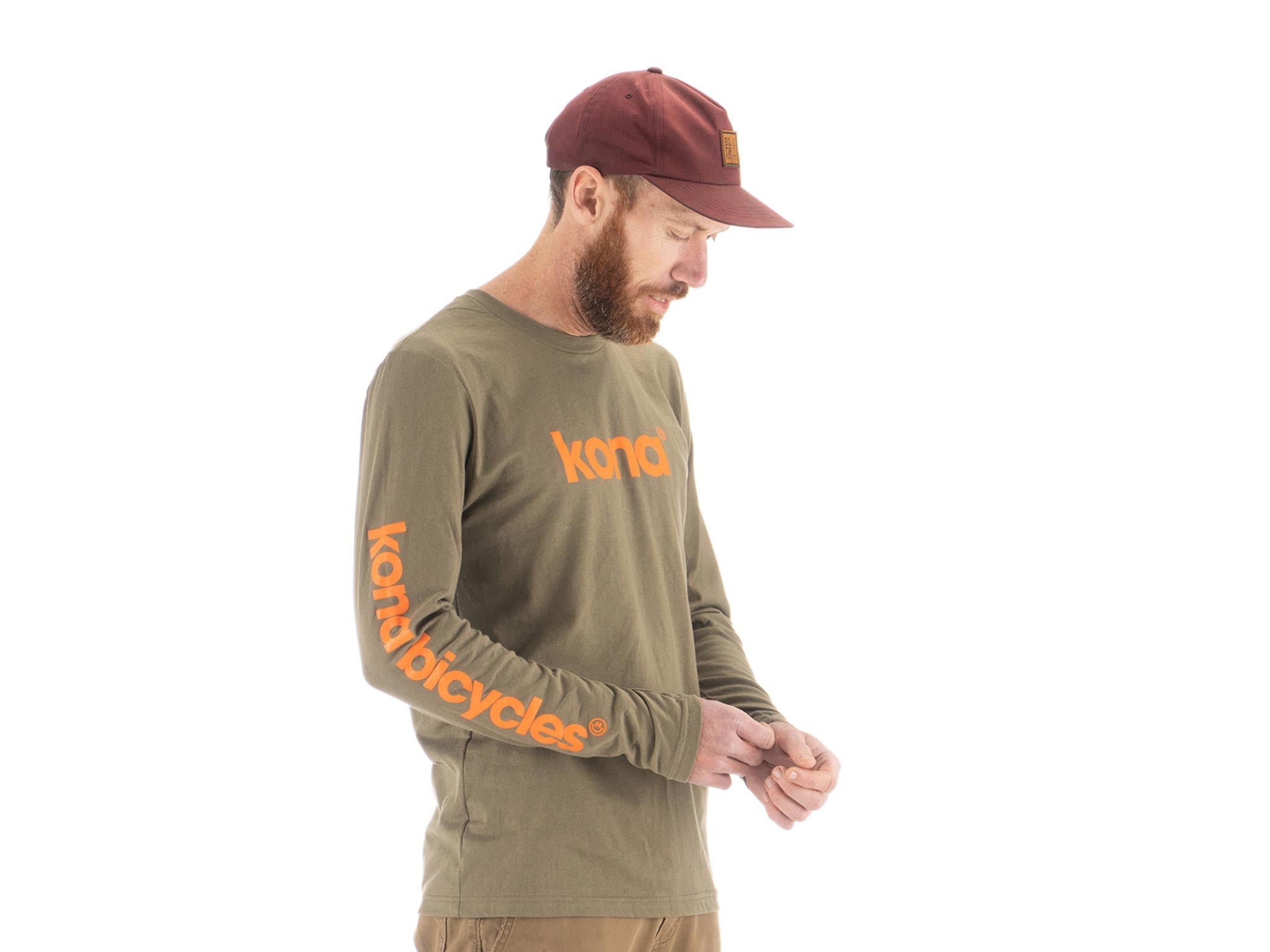 Model wearing streetwear long sleeve tee on city street
