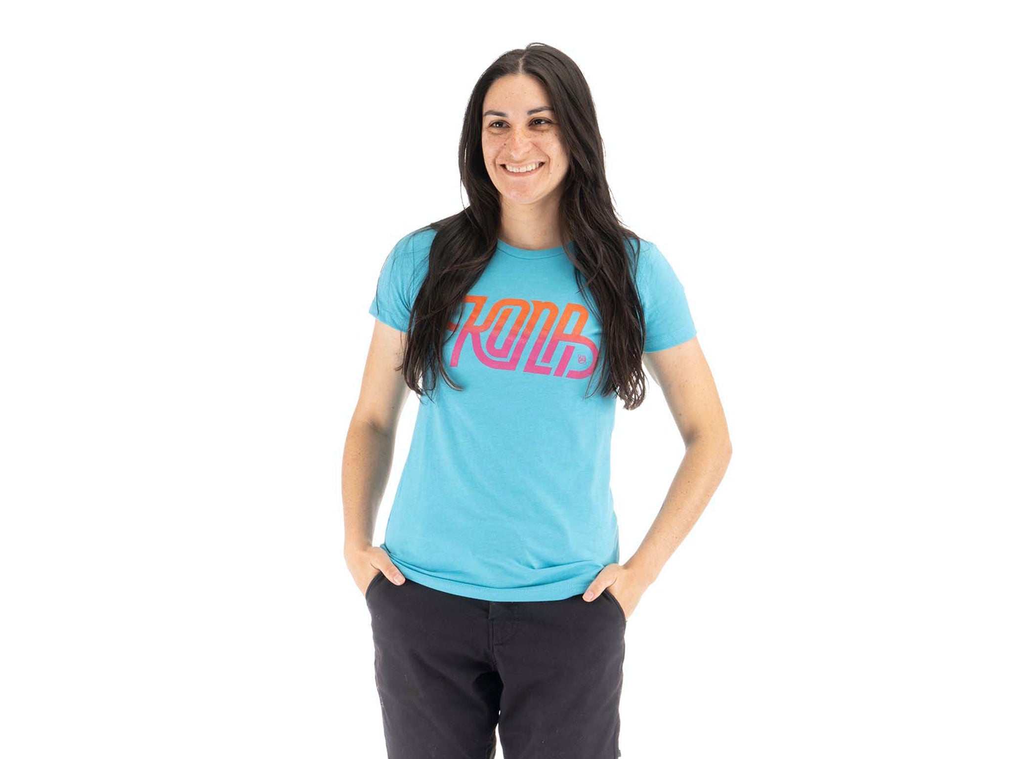 Woman wearing a womens curly t-shirt while jogging in the park
