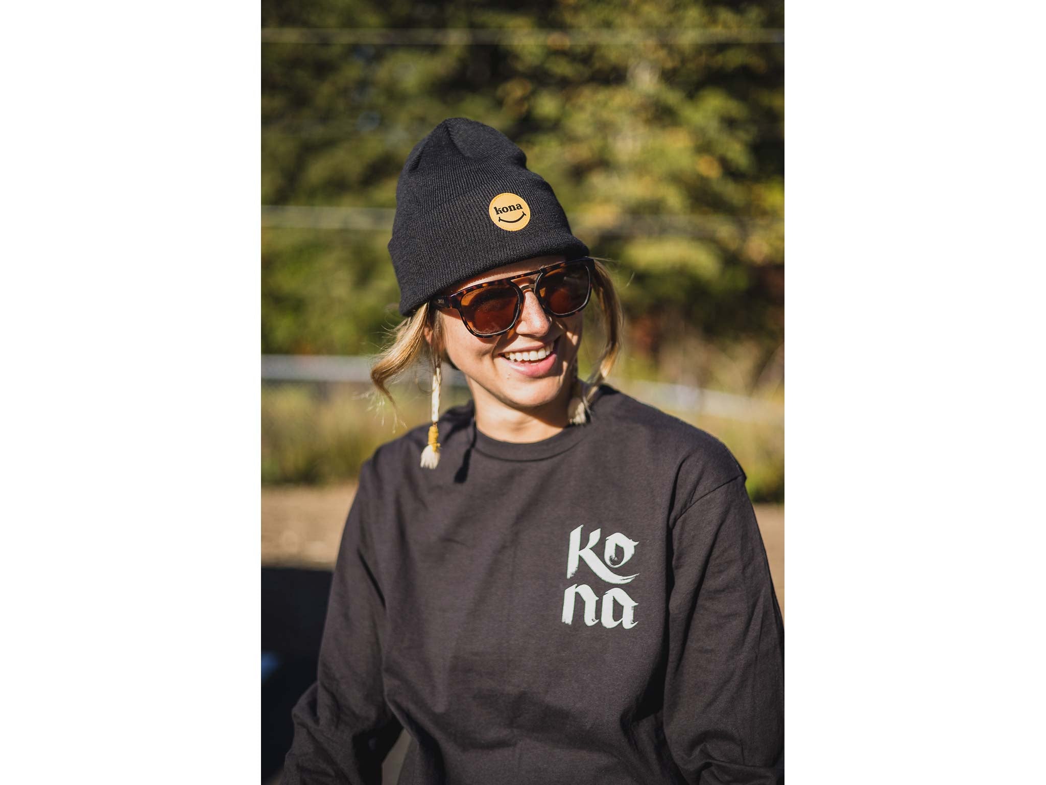 A cyclist wearing the Joyful Journeys Beanie, demonstrating its stylish look.