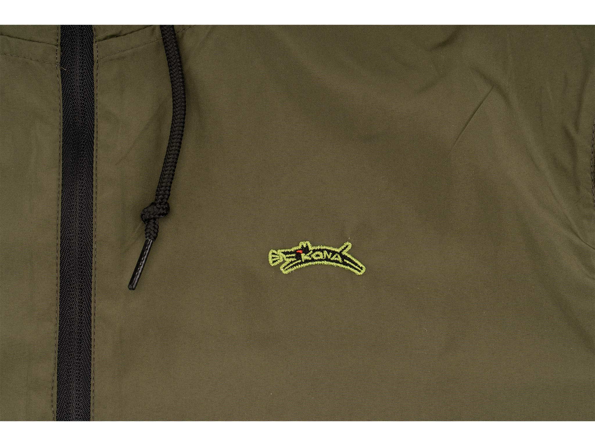 Kona K9 Lightweight Dog Windbreaker in action during a rainy walk