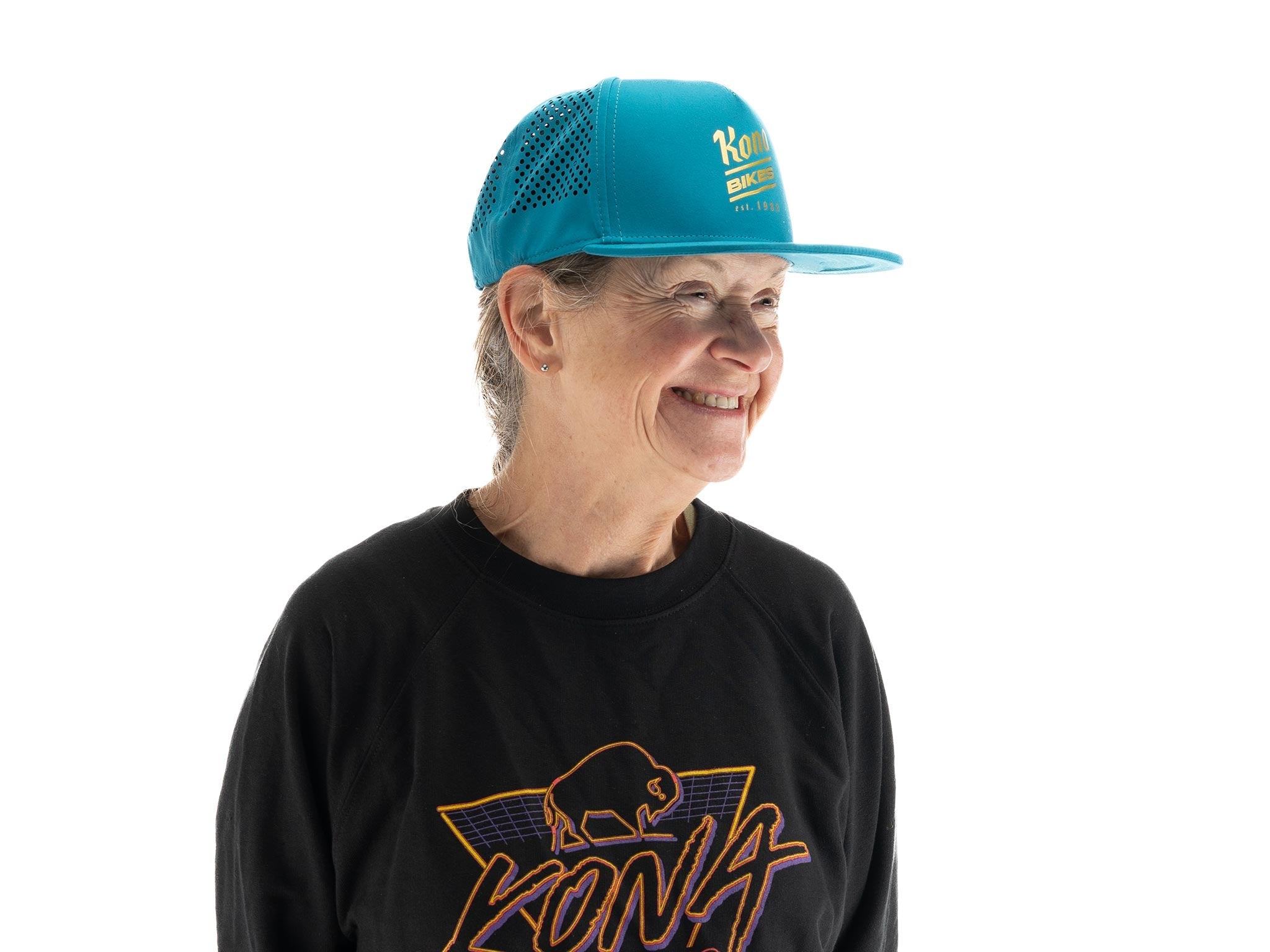 Brewed Athletic Trucker Hat worn outdoors during a sunny day, showcasing its style and comfort.