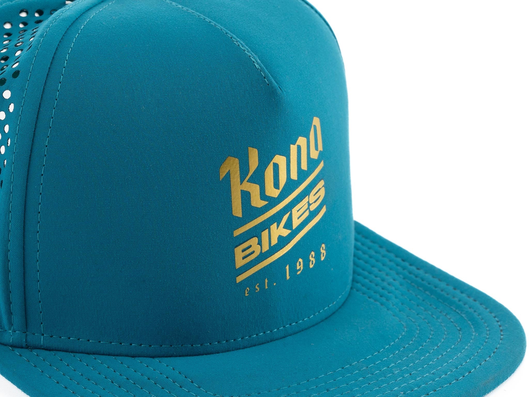 Side view of the Brewed Athletic Trucker Hat highlighting its adjustable snap-back feature.