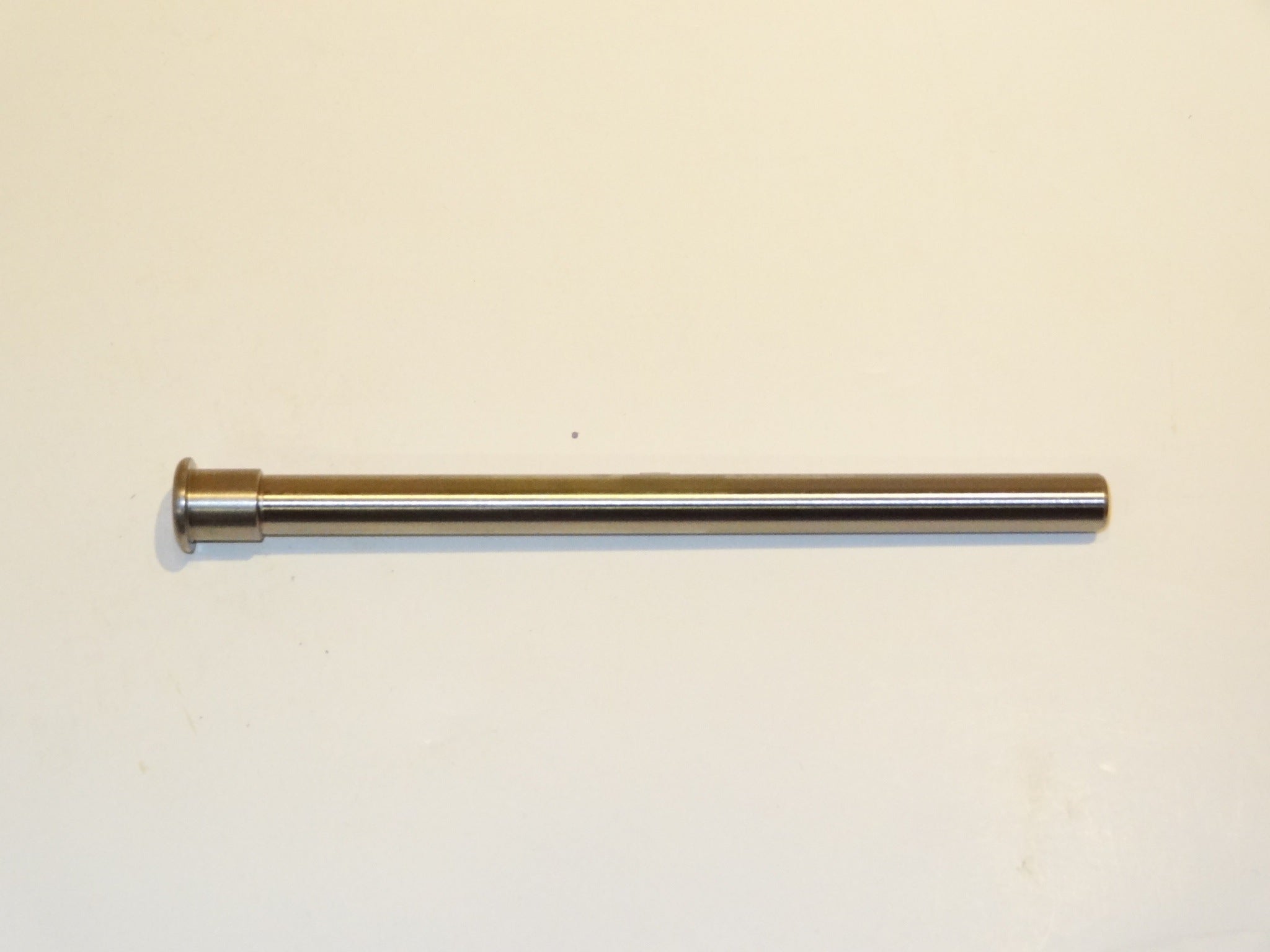 CMPAX04 thru axle from the side, showcasing its durable design for D.O.P.E 12 dropouts.