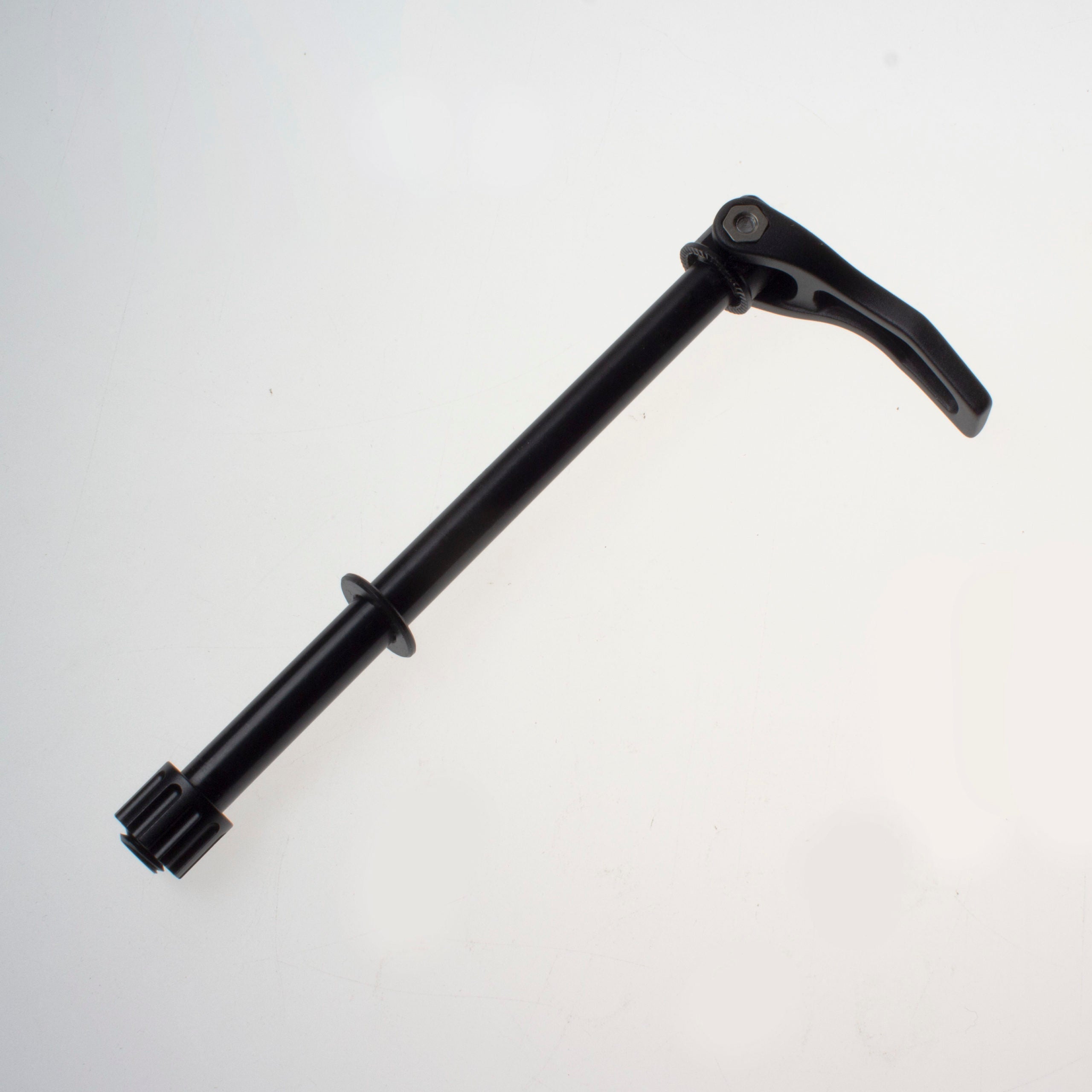 Cmpax06 thru axle showcasing robust design and compatibility for rear hubs.
