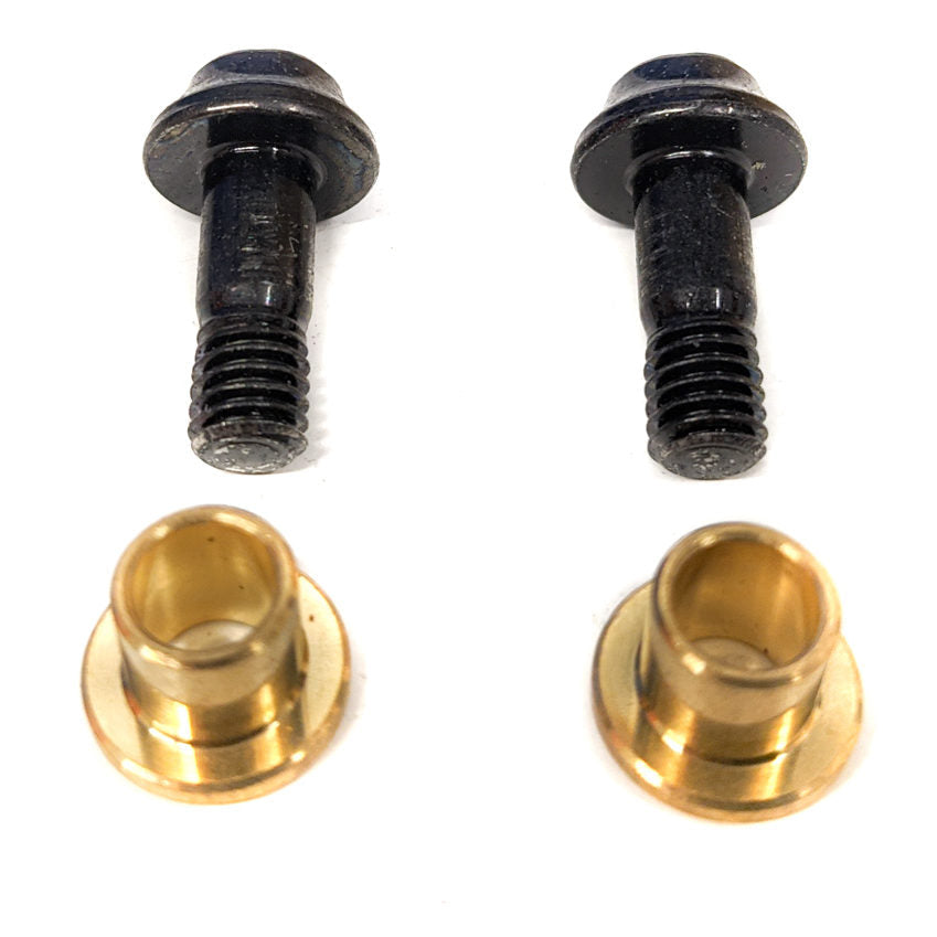 Close-up of brass Magic Link bushing installed on Kona suspension arm