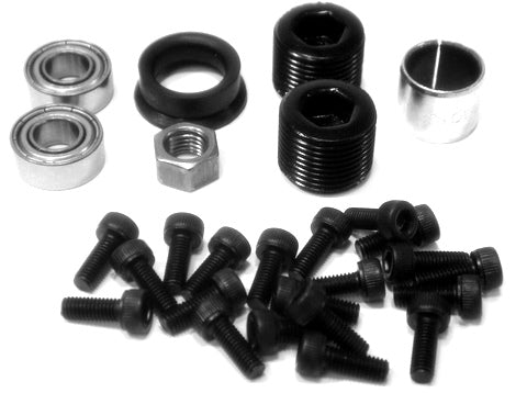 Close-up of Wah Wah aluminum pedal rebuild kit parts, highlighting bearings and seals.