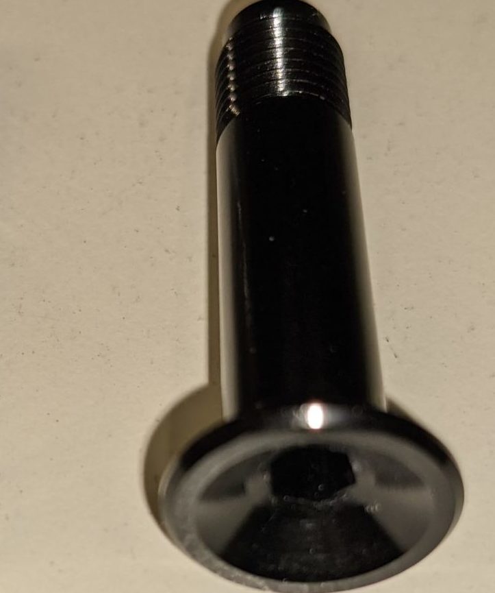 Kona Process G1 upper shock bolt from the side, showcasing fine thread pitch.