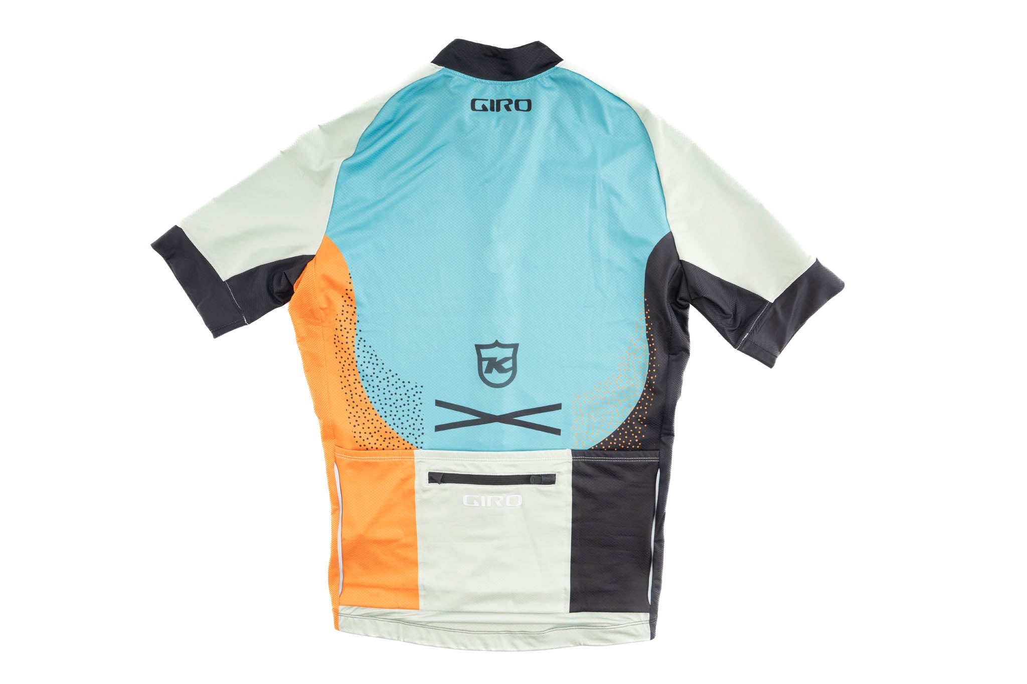 Cyclist wearing the breathable performance jersey during a night ride with reflective elements visible