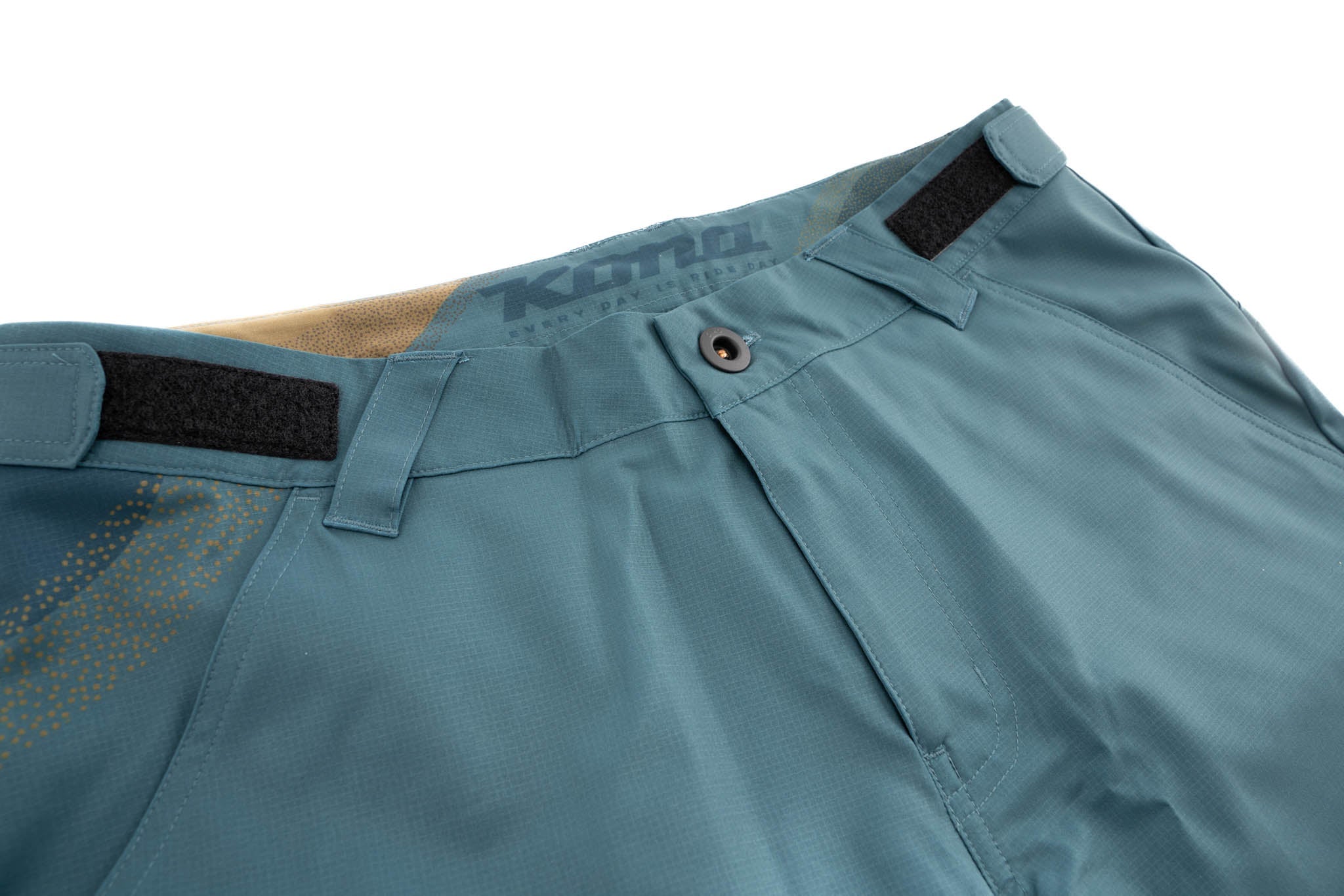 Man wearing lightweight horizon shorts while biking outdoors