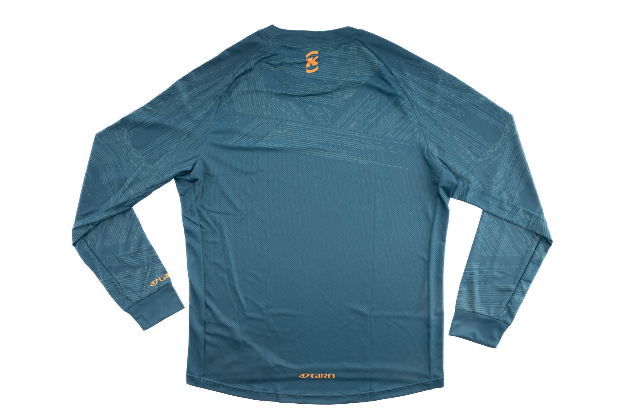 Rider wearing the long sleeve jersey on a scenic trail, illustrating its breathability.