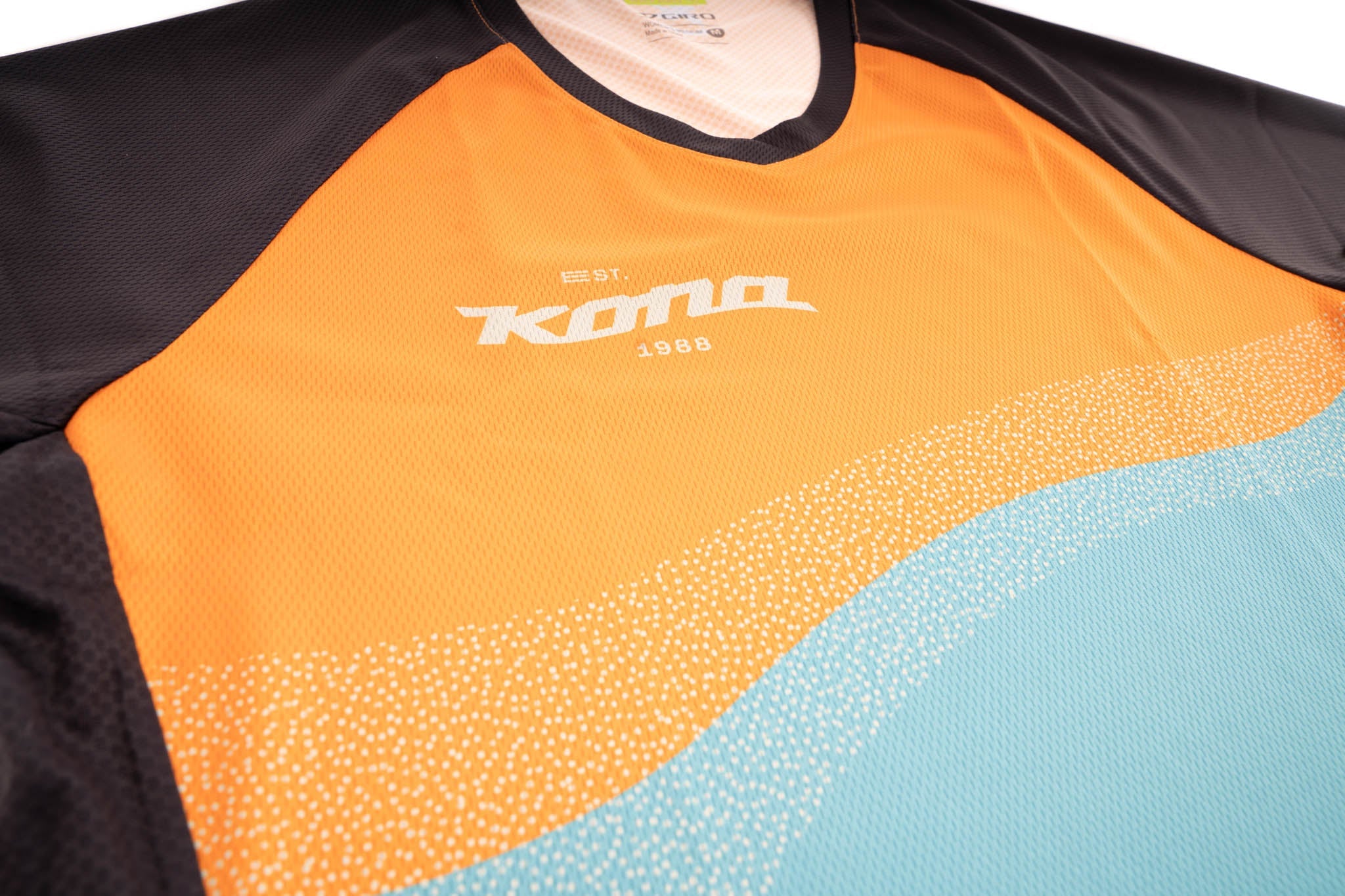 Back view of the Horizon Jersey featuring screen-printed logos and drop-shaped design.