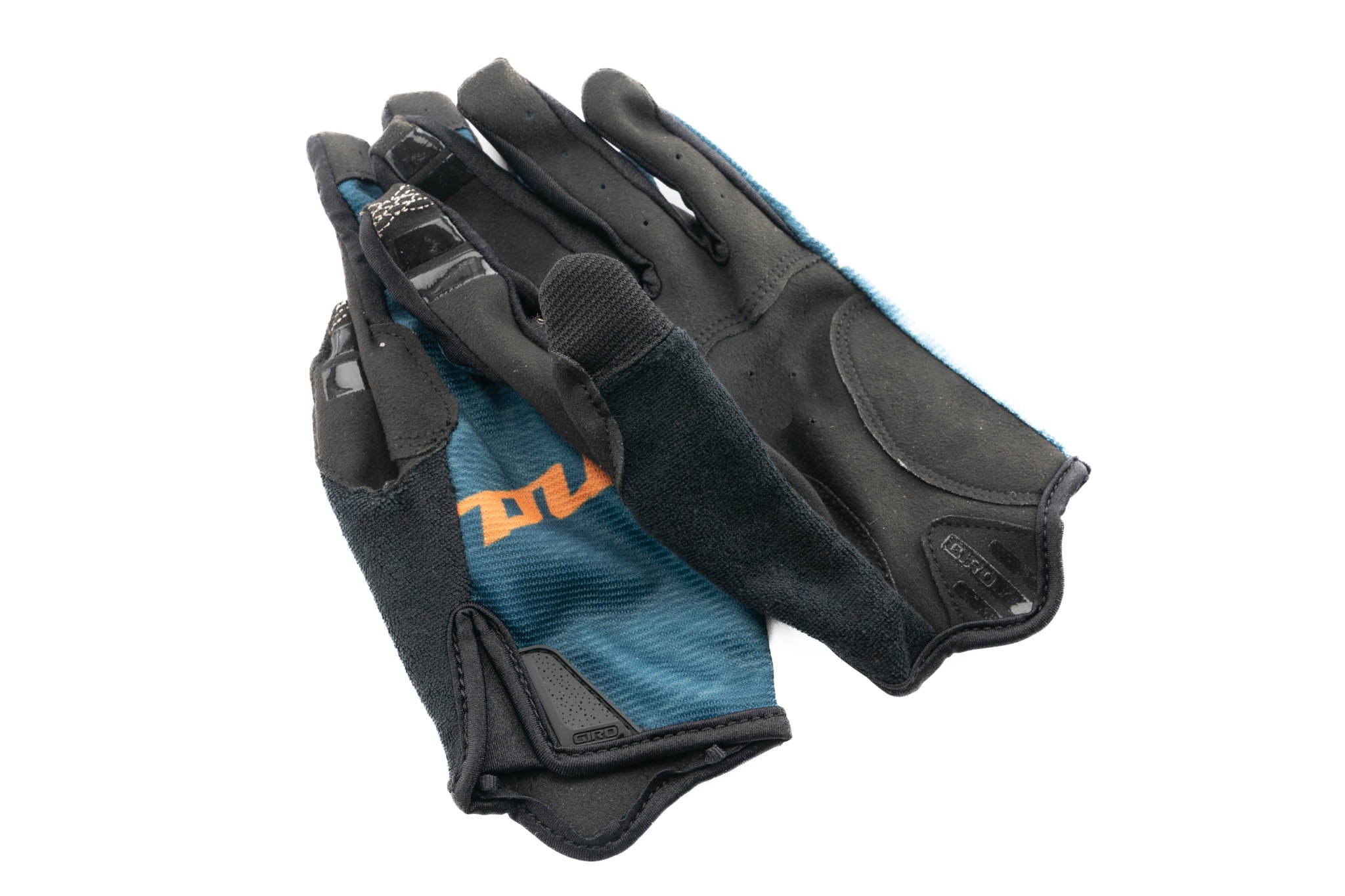 Rider wearing lightweight, moisture-wicking bike gloves during trail ride