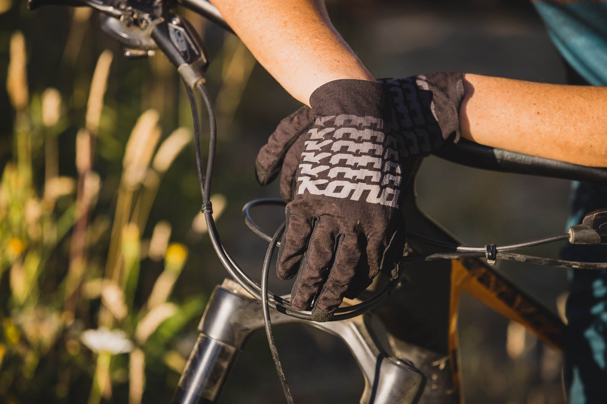 Kona Nightfall gloves showcasing breathable fabric and high grip design for mountain biking.