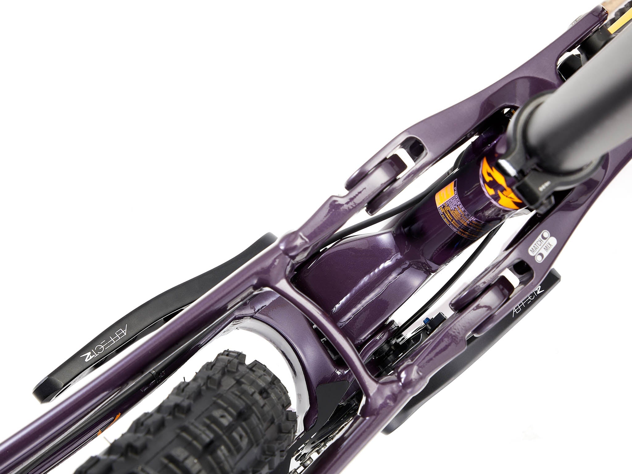 Rider navigating a challenging downhill trail on the Process X DH, demonstrating its stability and agility.