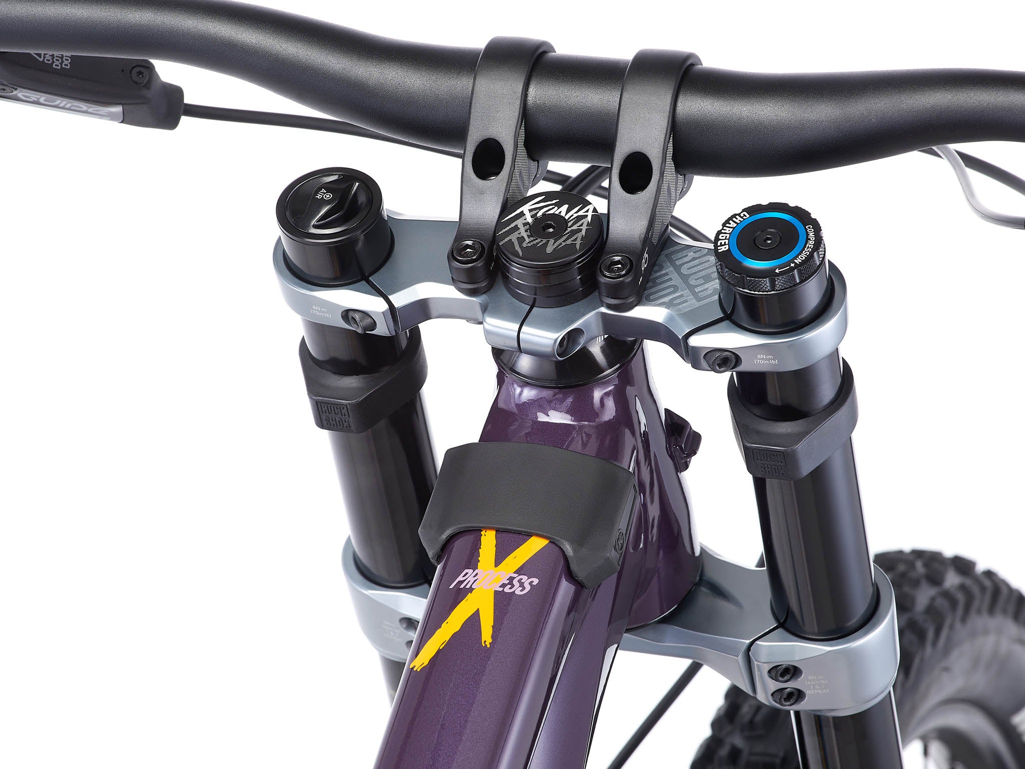 Rider navigating a challenging downhill trail on the Process X DH, demonstrating its stability and agility.