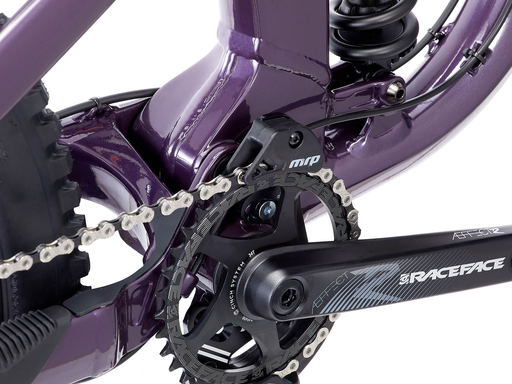 Rider navigating a challenging downhill trail on the Process X DH, demonstrating its stability and agility.