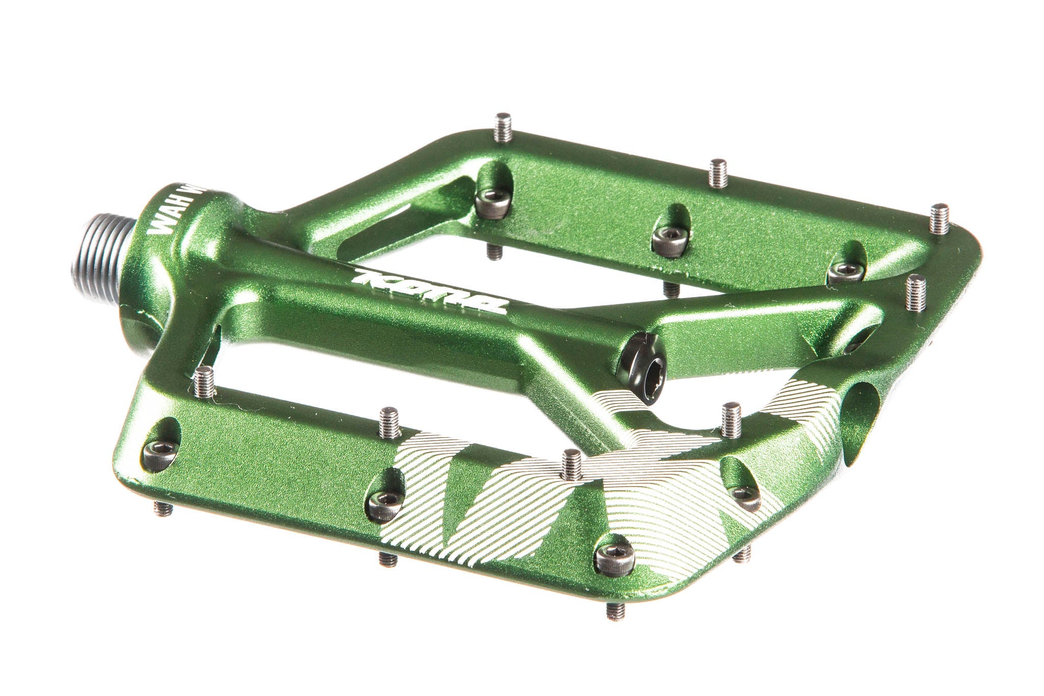 Cyclist using flat pedals for mountain biking on rugged terrain